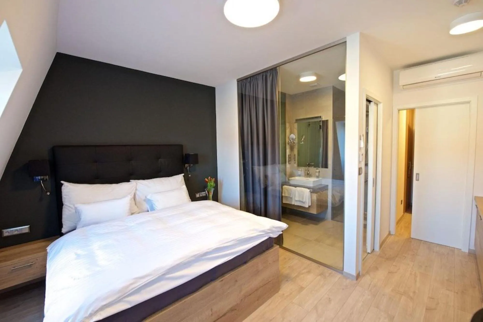 Bathroom, Bed in Grand Hotel Trenčin