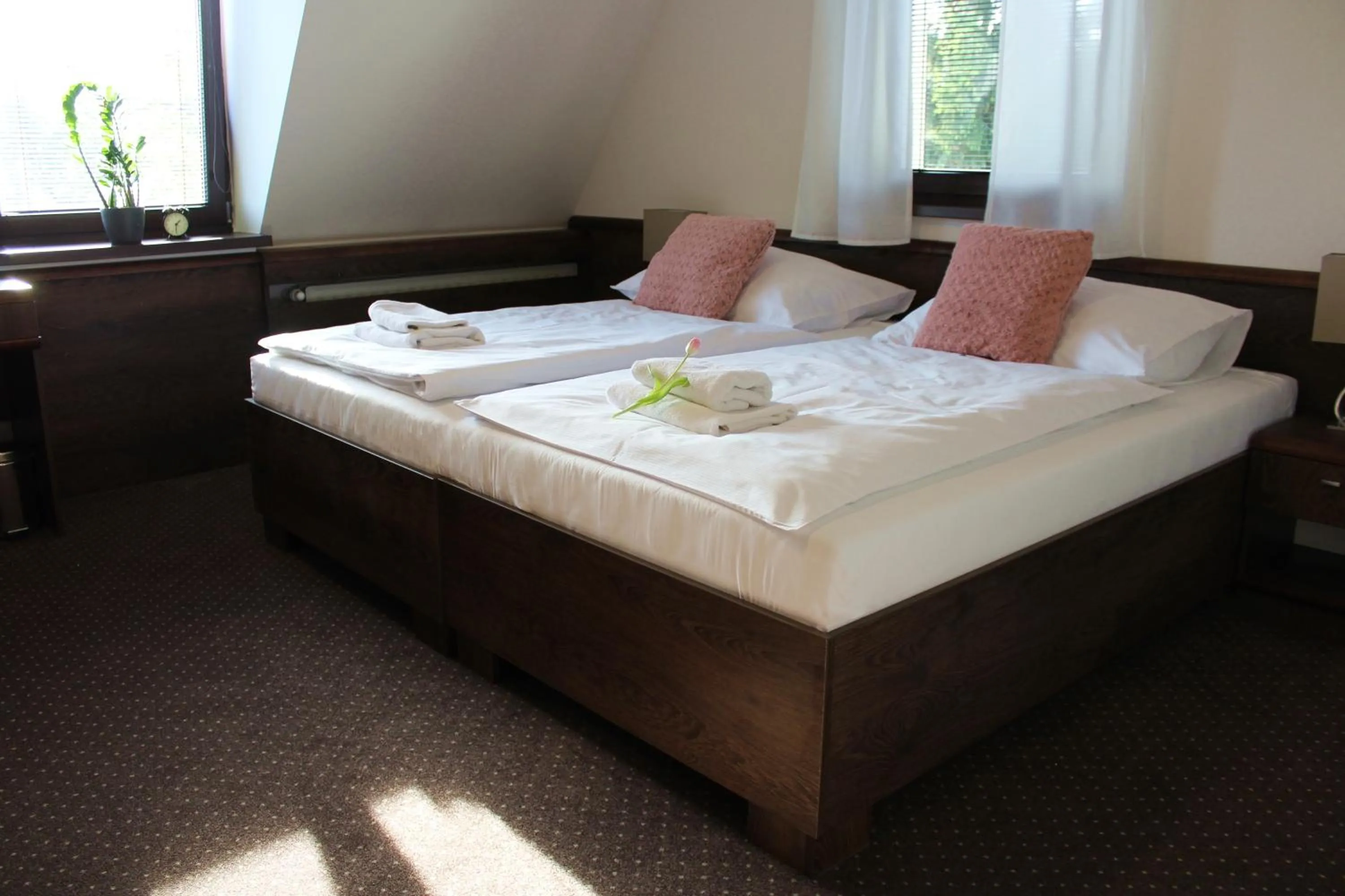 Bed in Penzión Wellness & Restaurant Zoborská, free parking