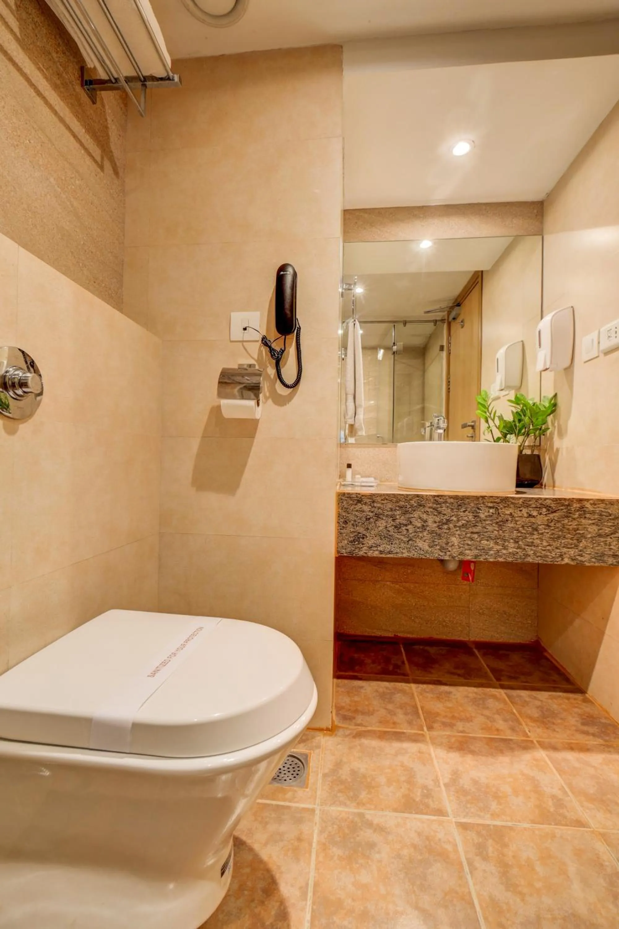 Toilet in The SSK Solitaire Hotel & Banquets