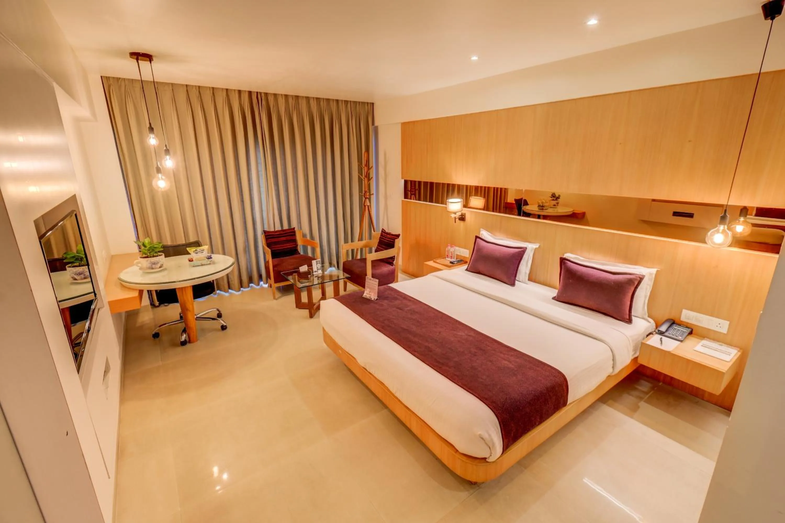 Photo of the whole room, Bed in The SSK Solitaire Hotel & Banquets