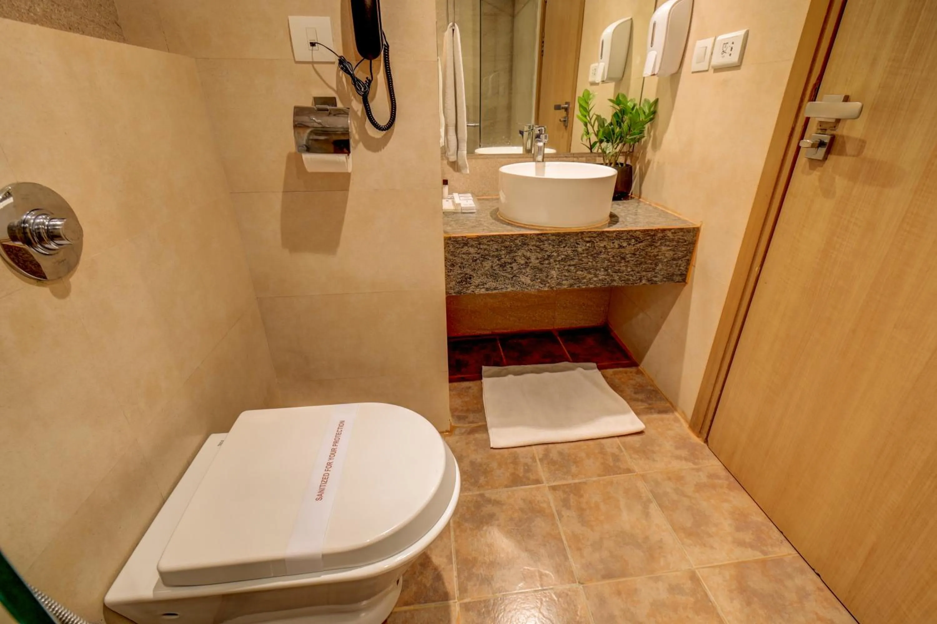 Toilet in The SSK Solitaire Hotel & Banquets