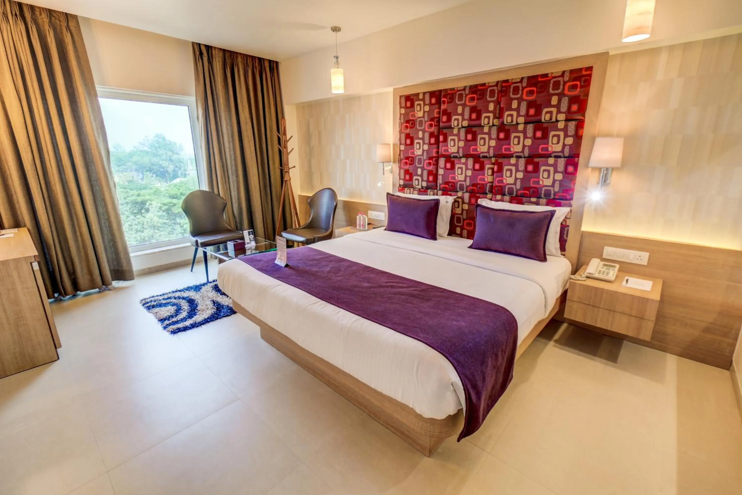 Bedroom, Bed in The SSK Solitaire Hotel & Banquets