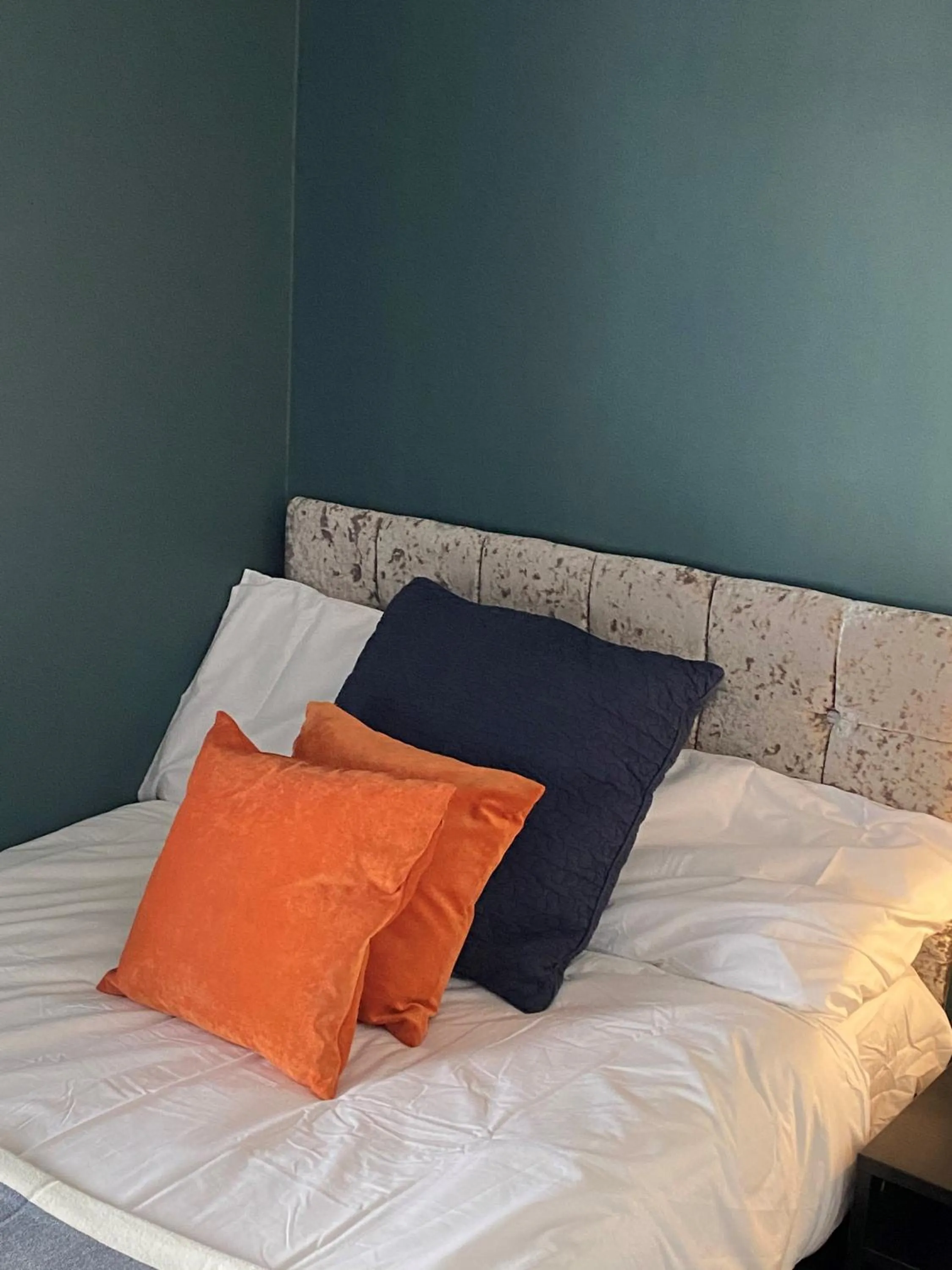 Bed in Raby Apartment