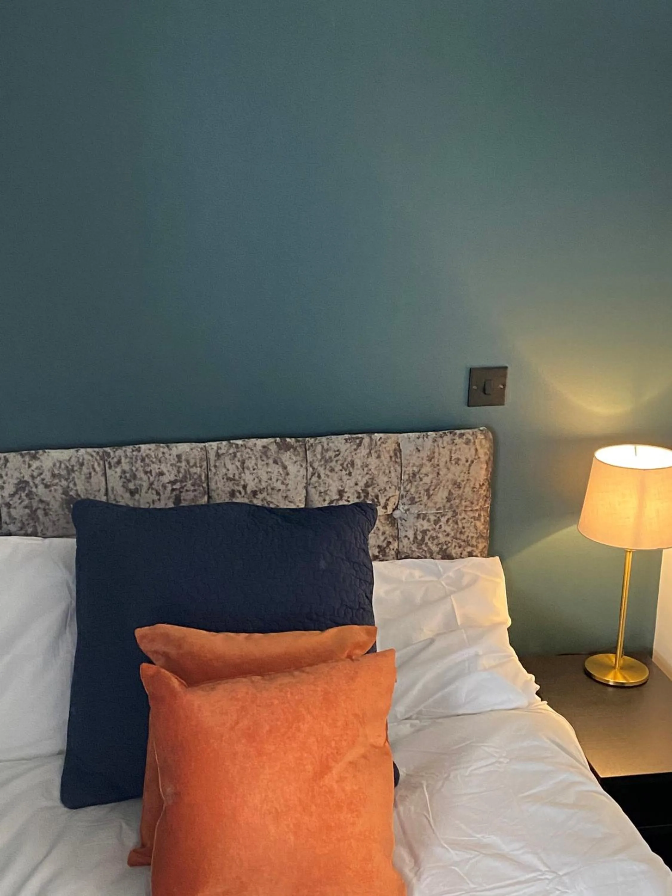 Bed in Raby Apartment