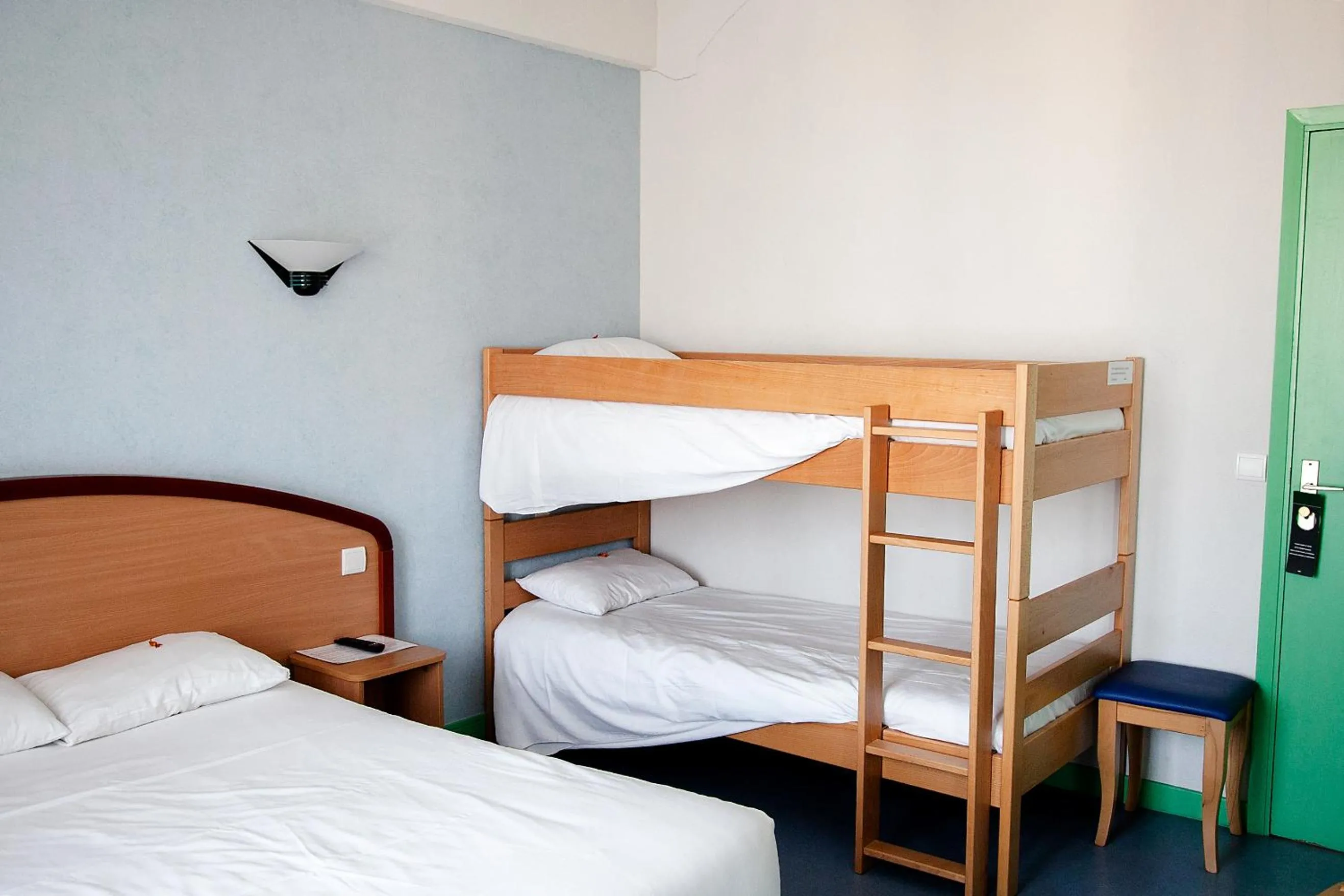 Photo of the whole room, Bed in Logis Hôtel du Commerce