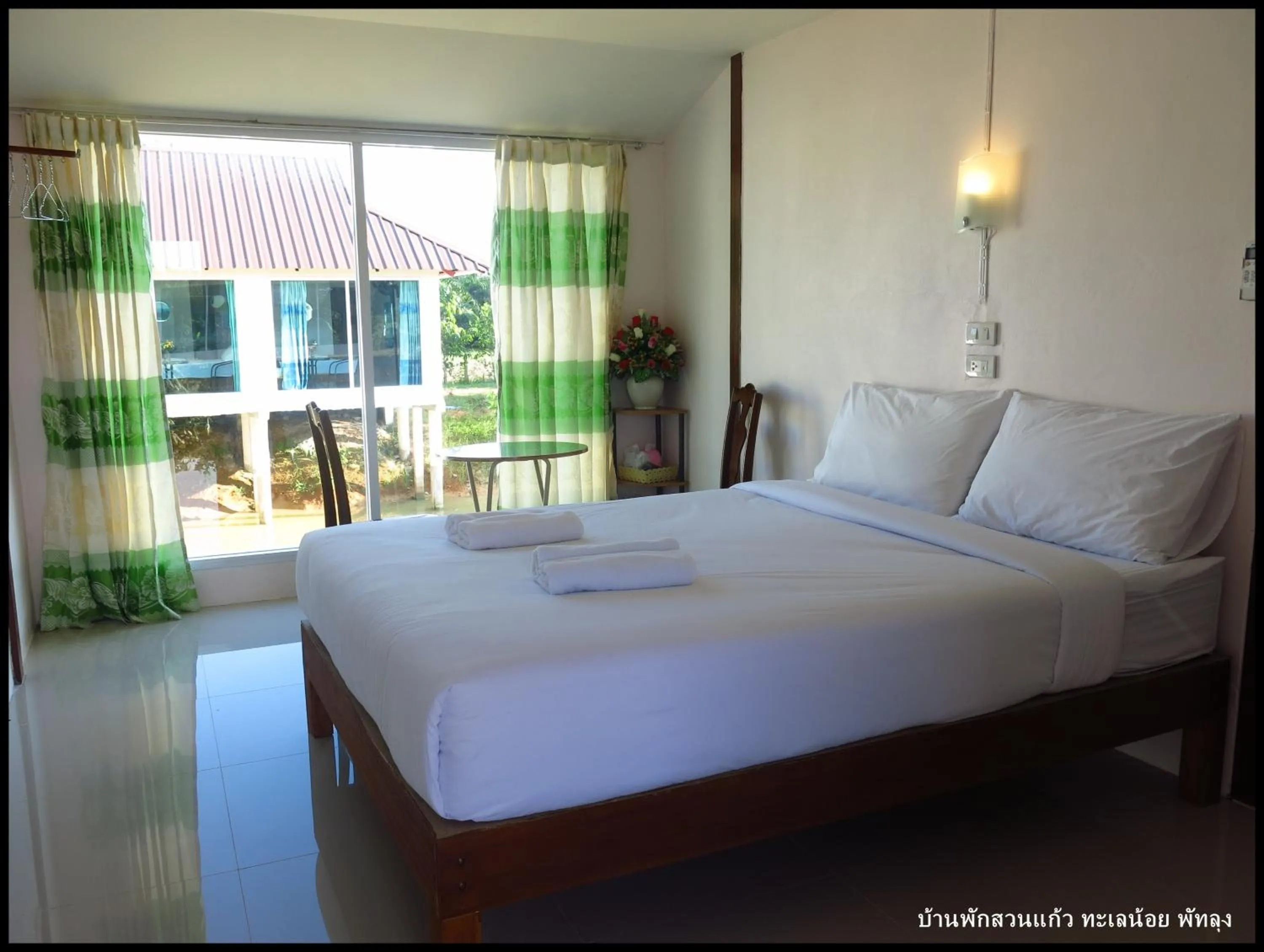 Photo of the whole room, Bed in Banpak Suankaew Talaynoi