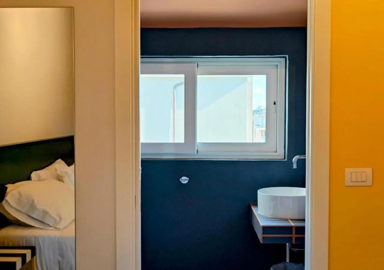 Bathroom, Bed in Hotel Graziella
