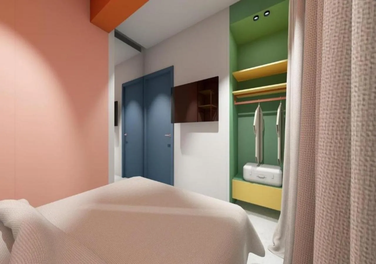 fireplace, Bed in Hotel Graziella