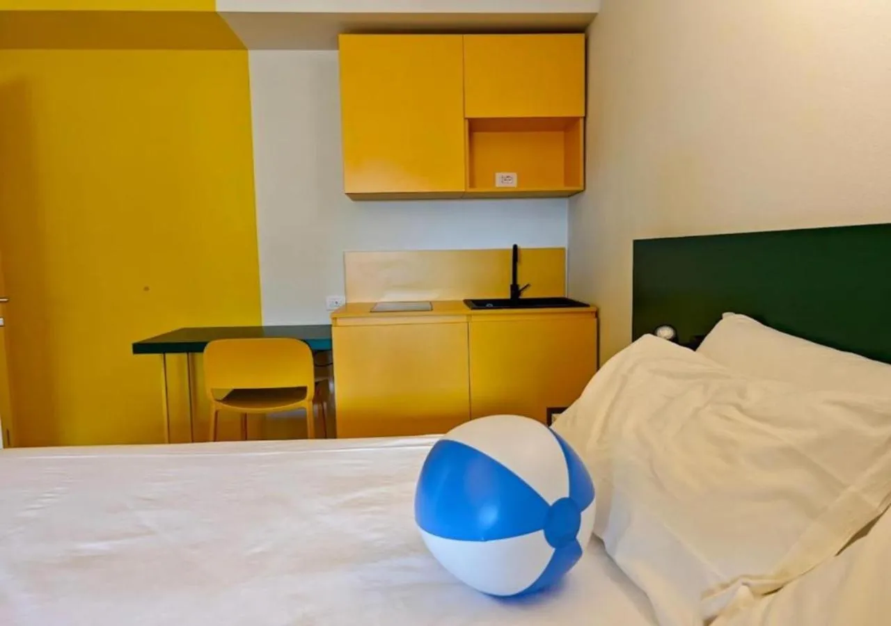 stove, Bed in Hotel Graziella