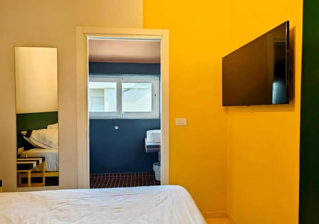 Bathroom, Bed in Hotel Graziella