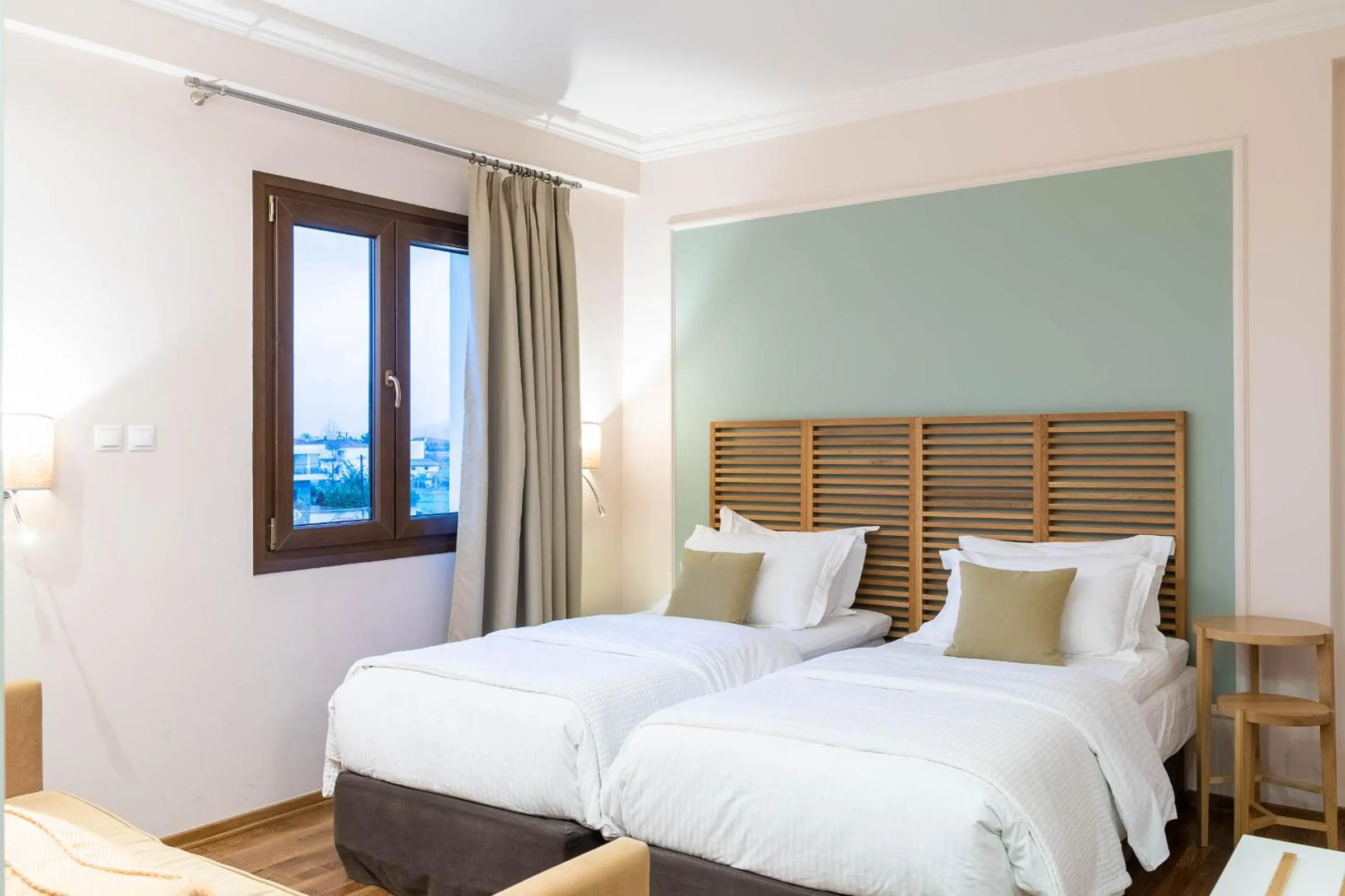 Bed in Olympus Terra Boutique Hotel