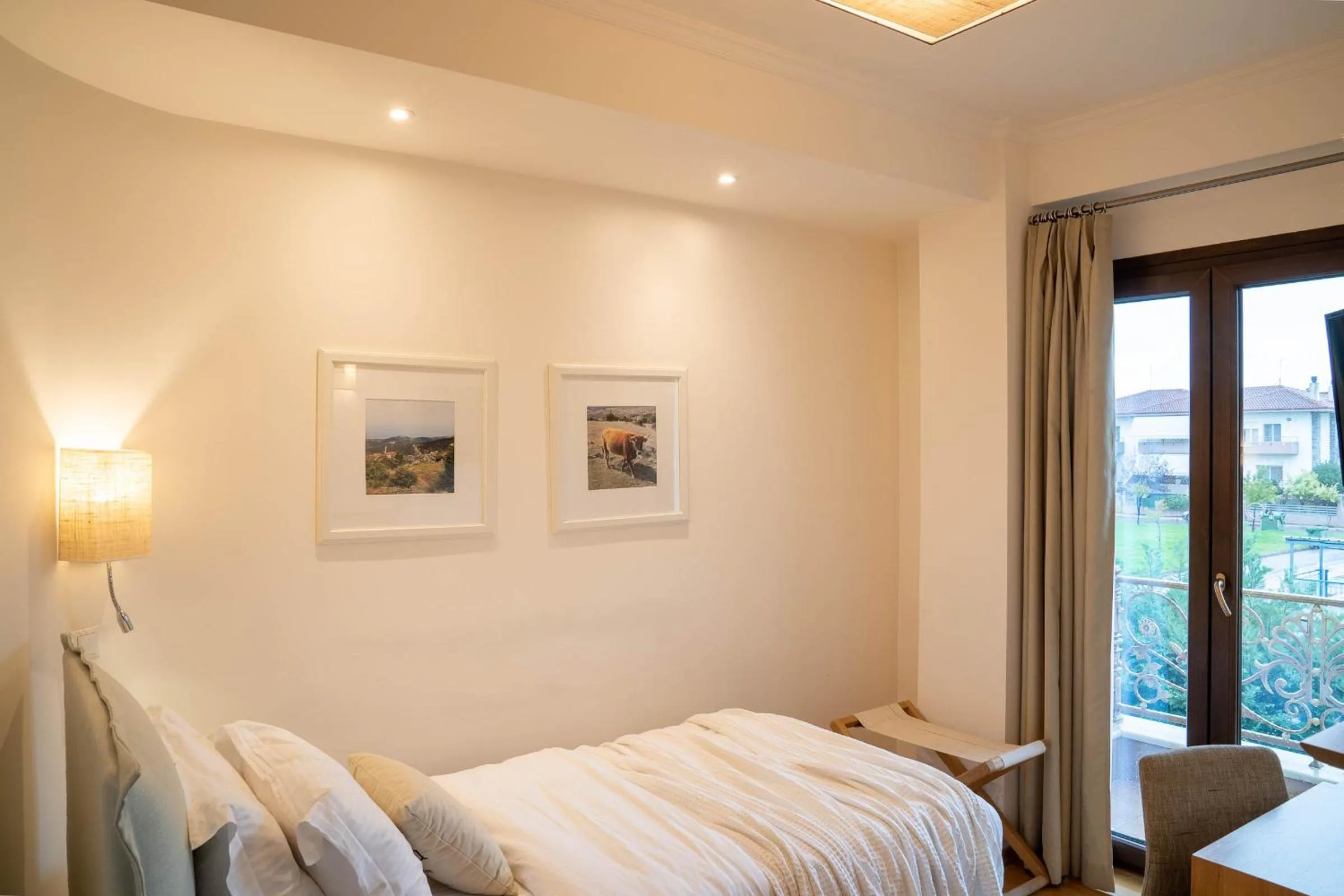 Bed in Olympus Terra Boutique Hotel