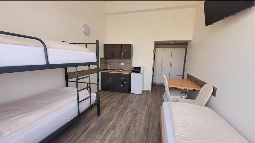 Bed in Drei Bären Hotel & Apartments