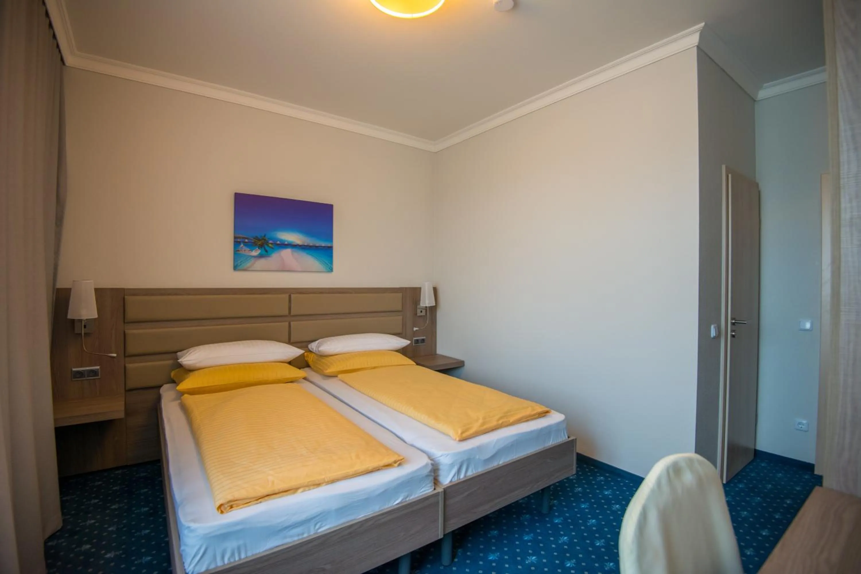 Bed in Drei Bären Hotel & Apartments