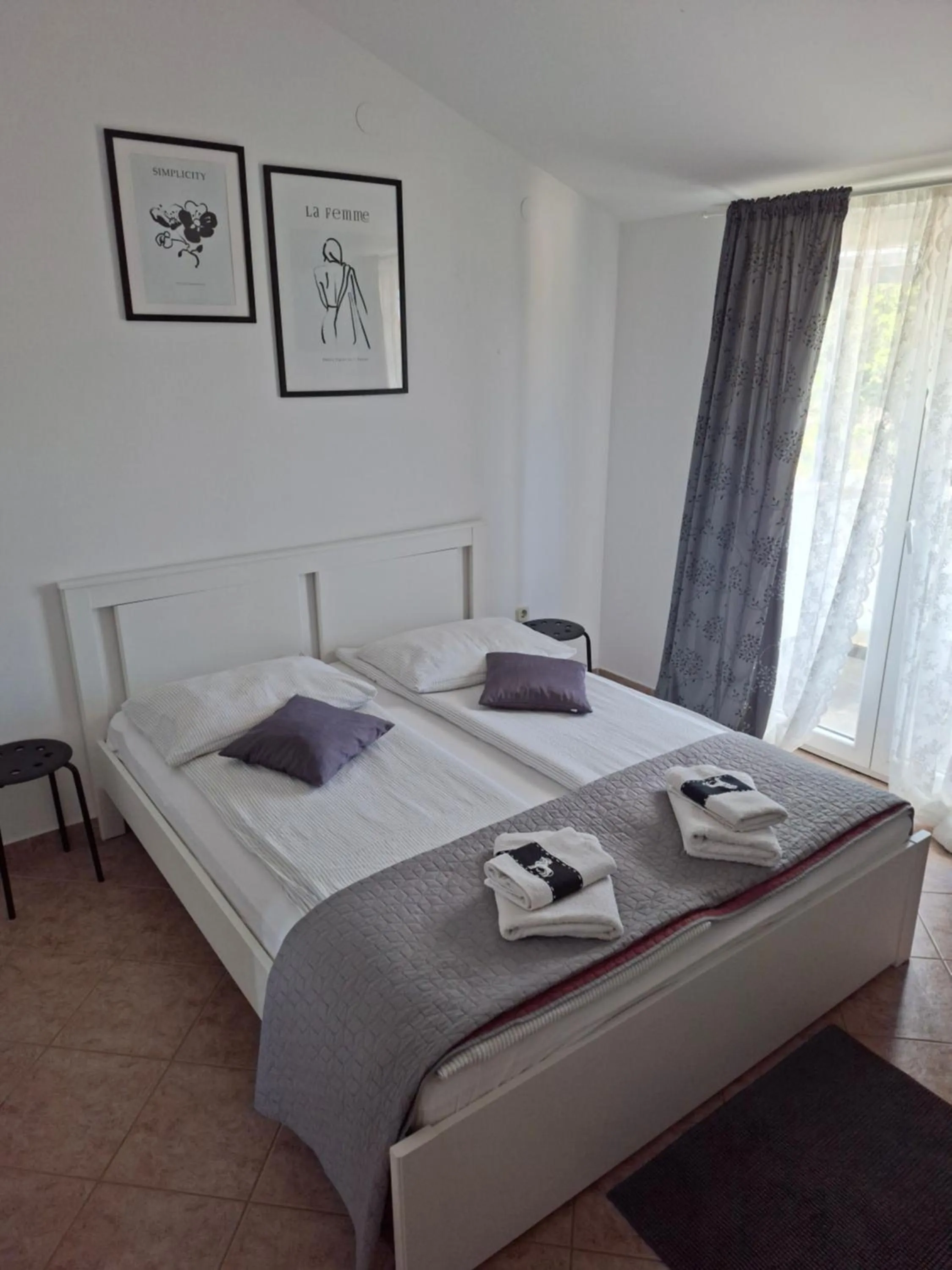 Bed in Martina Guest house-Rooms