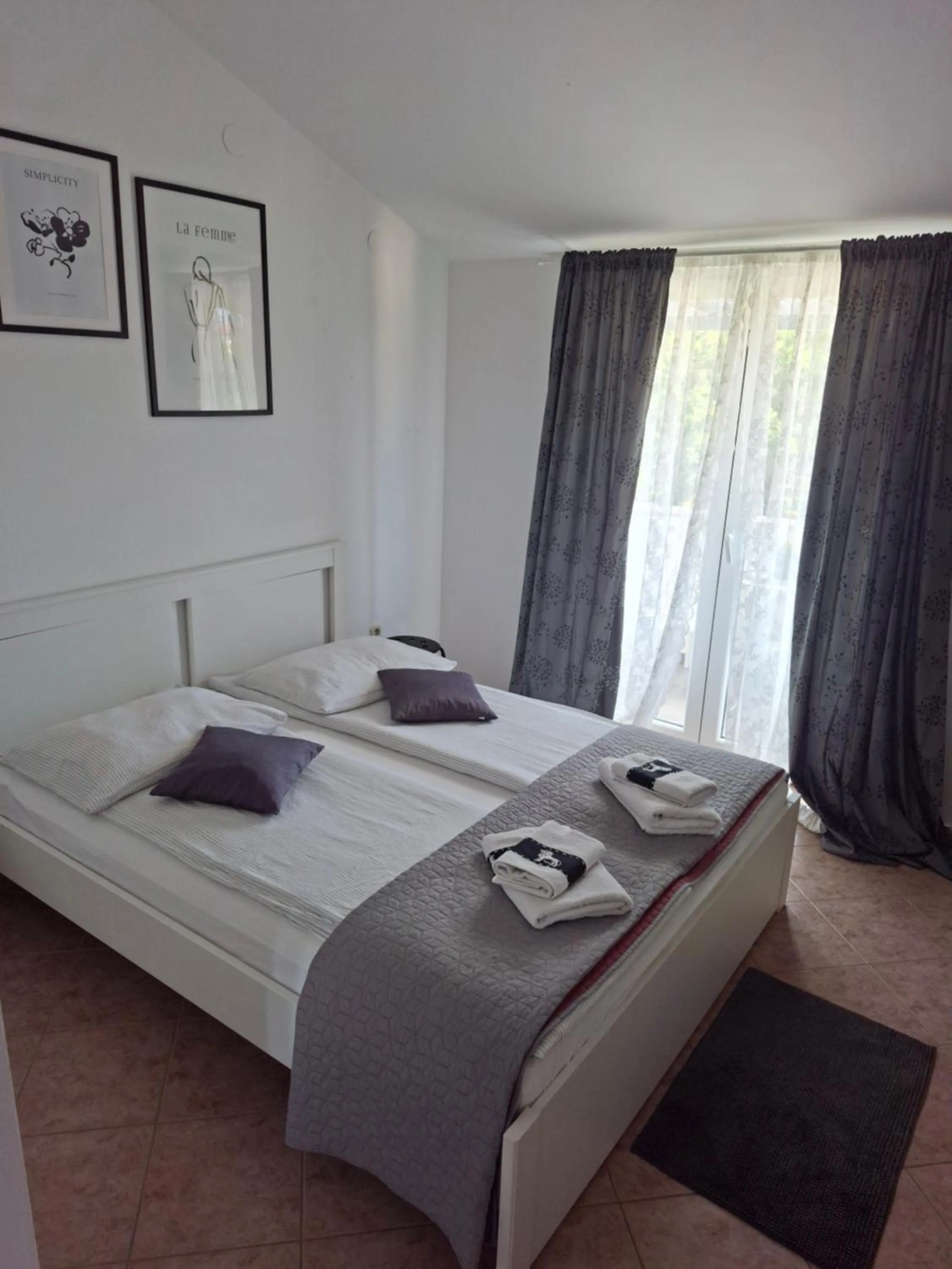 Bed in Martina Guest house-Rooms