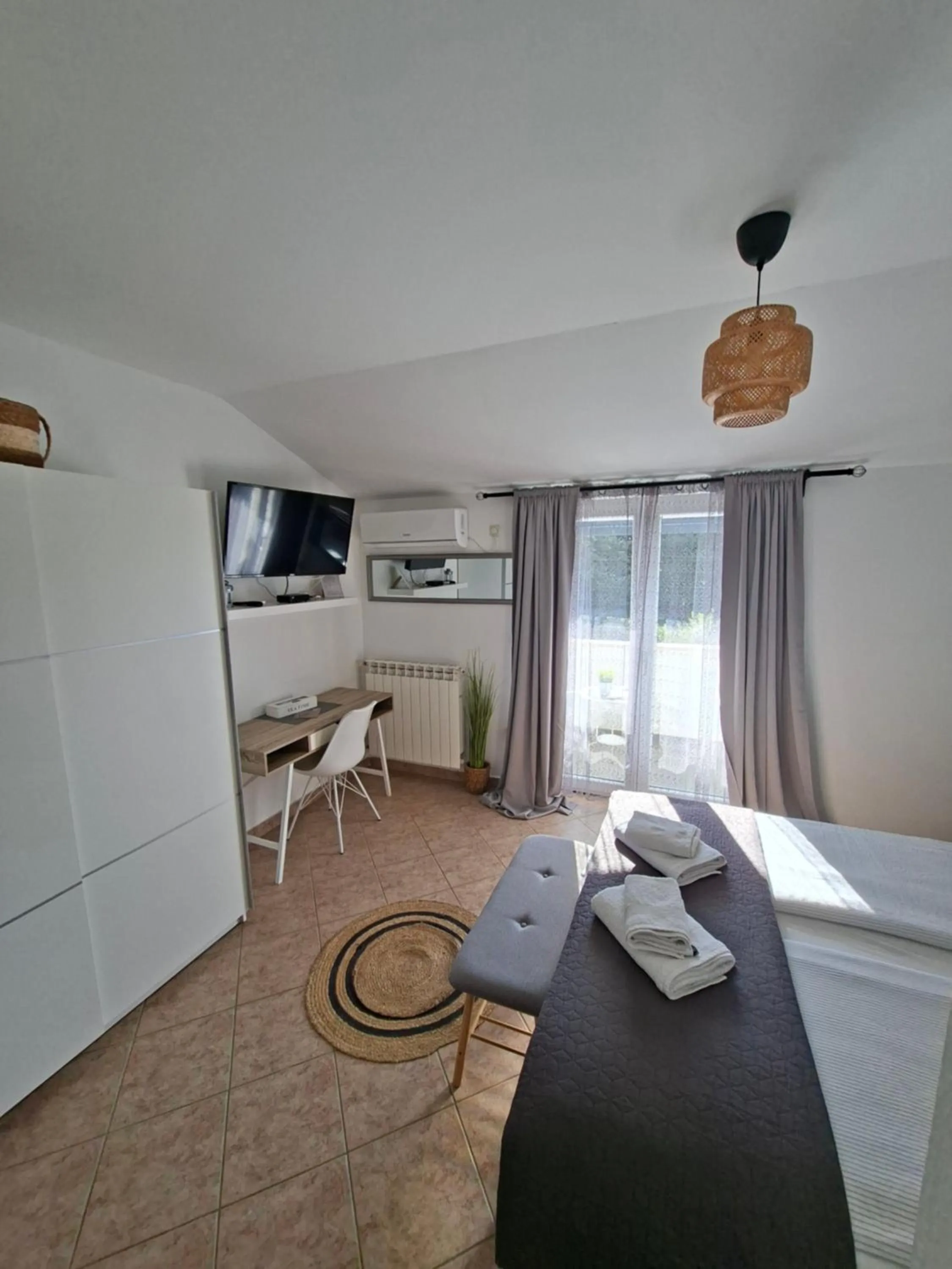 Bed in Martina Guest house-Rooms