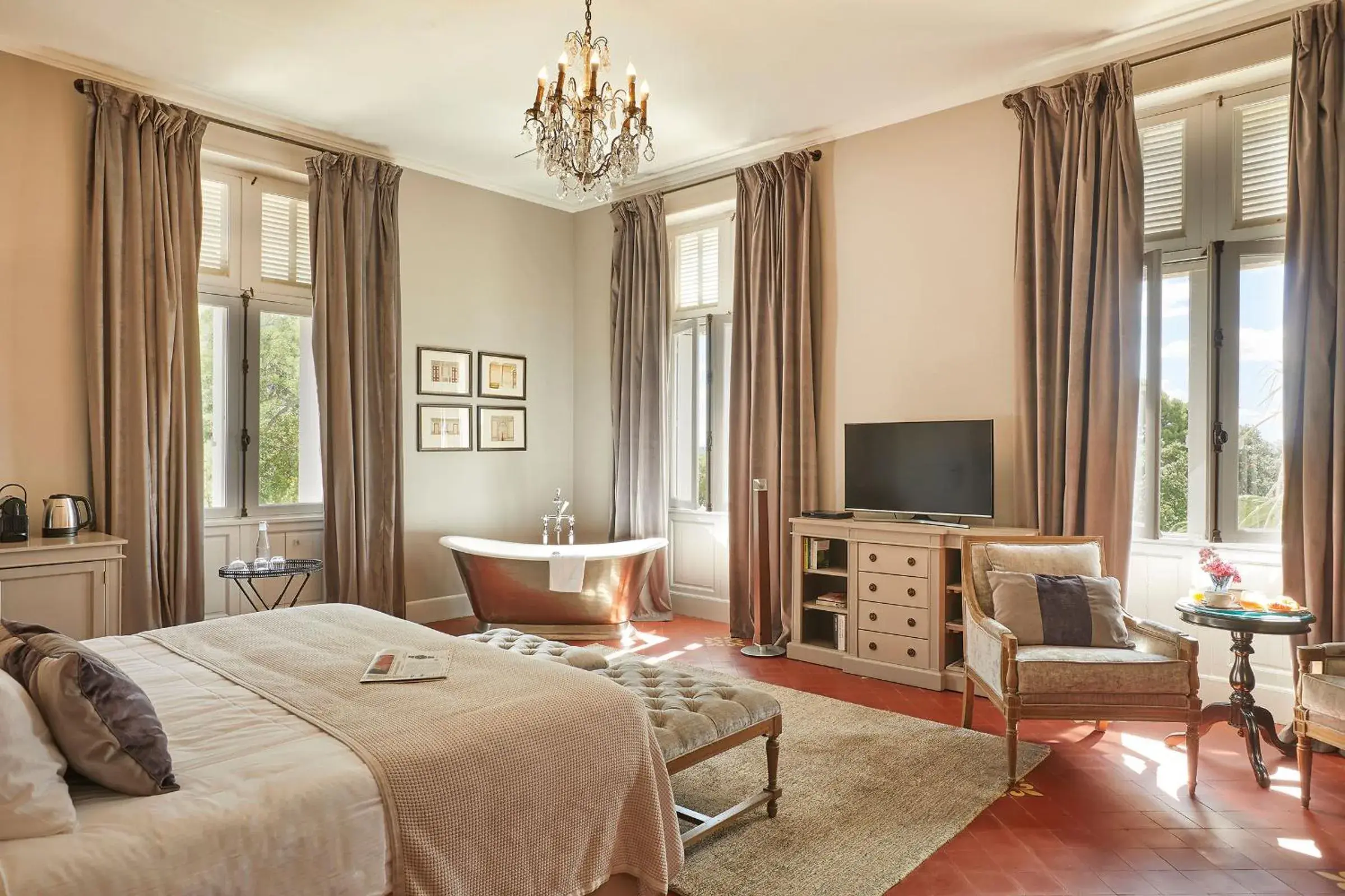 Luxe bedroom with pool view in Château St Pierre de Serjac Luxe bedroom with pool view in Château St Pierre de Serjac