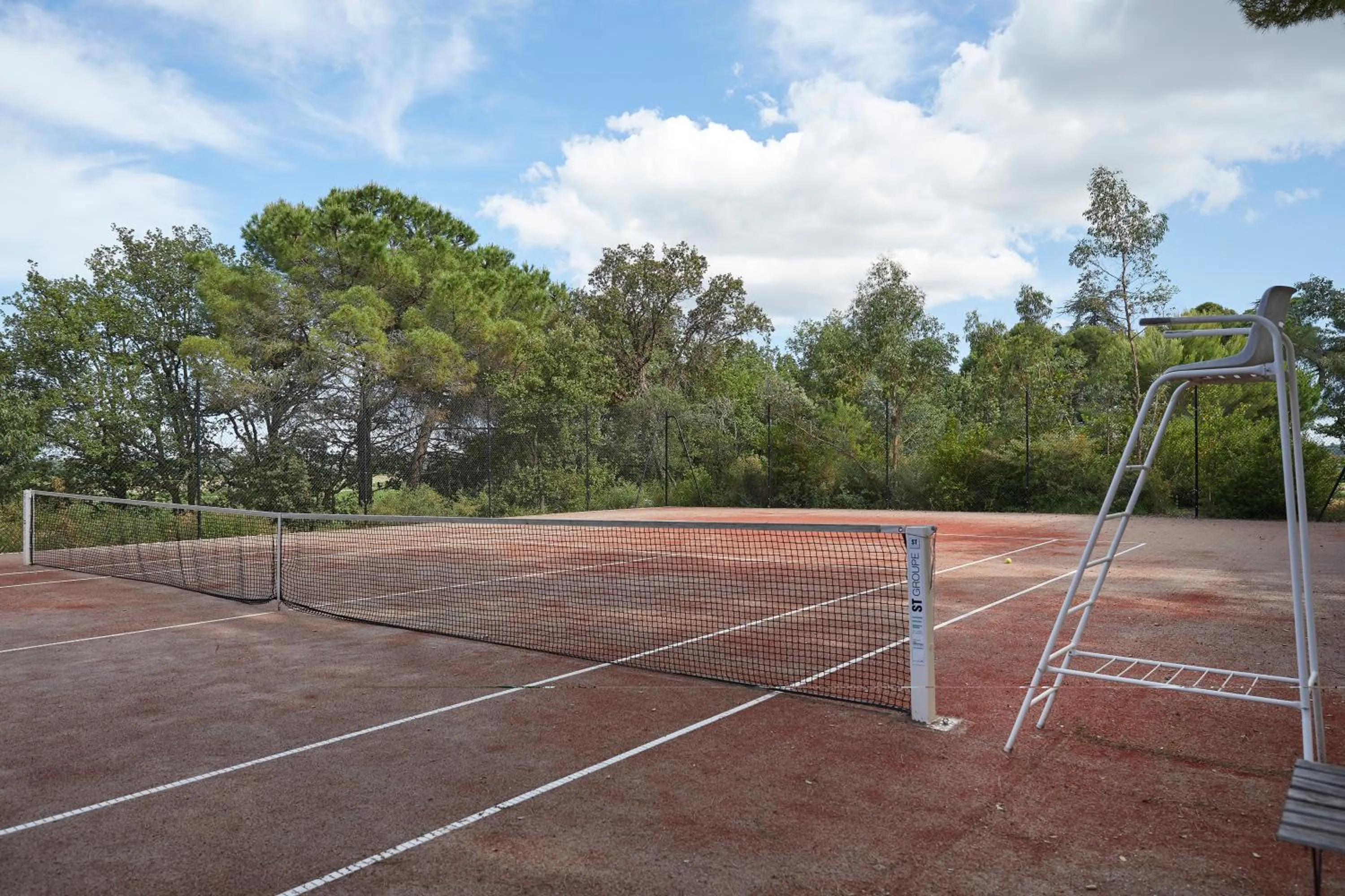 Tennis court in Château St Pierre de Serjac