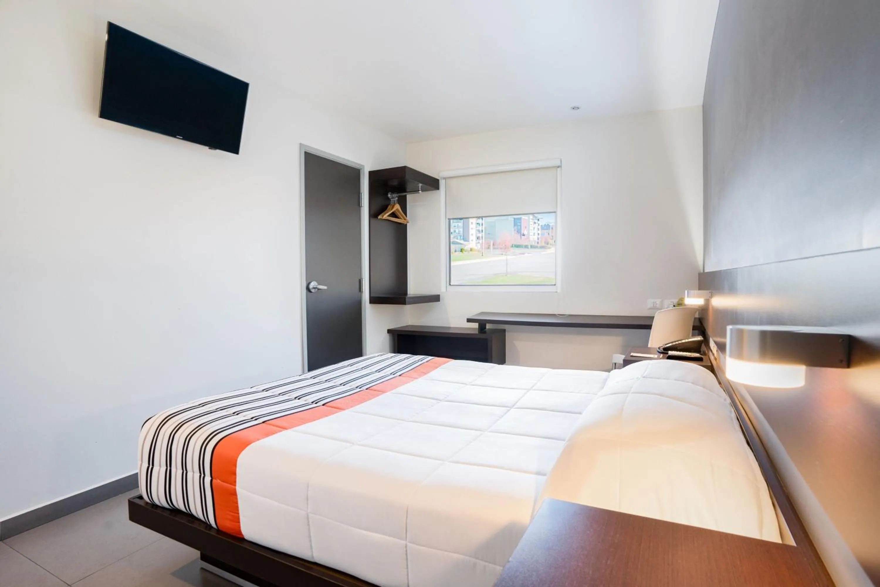 Photo of the whole room, Bed in City Express Junior by Marriott Aguascalientes Centro