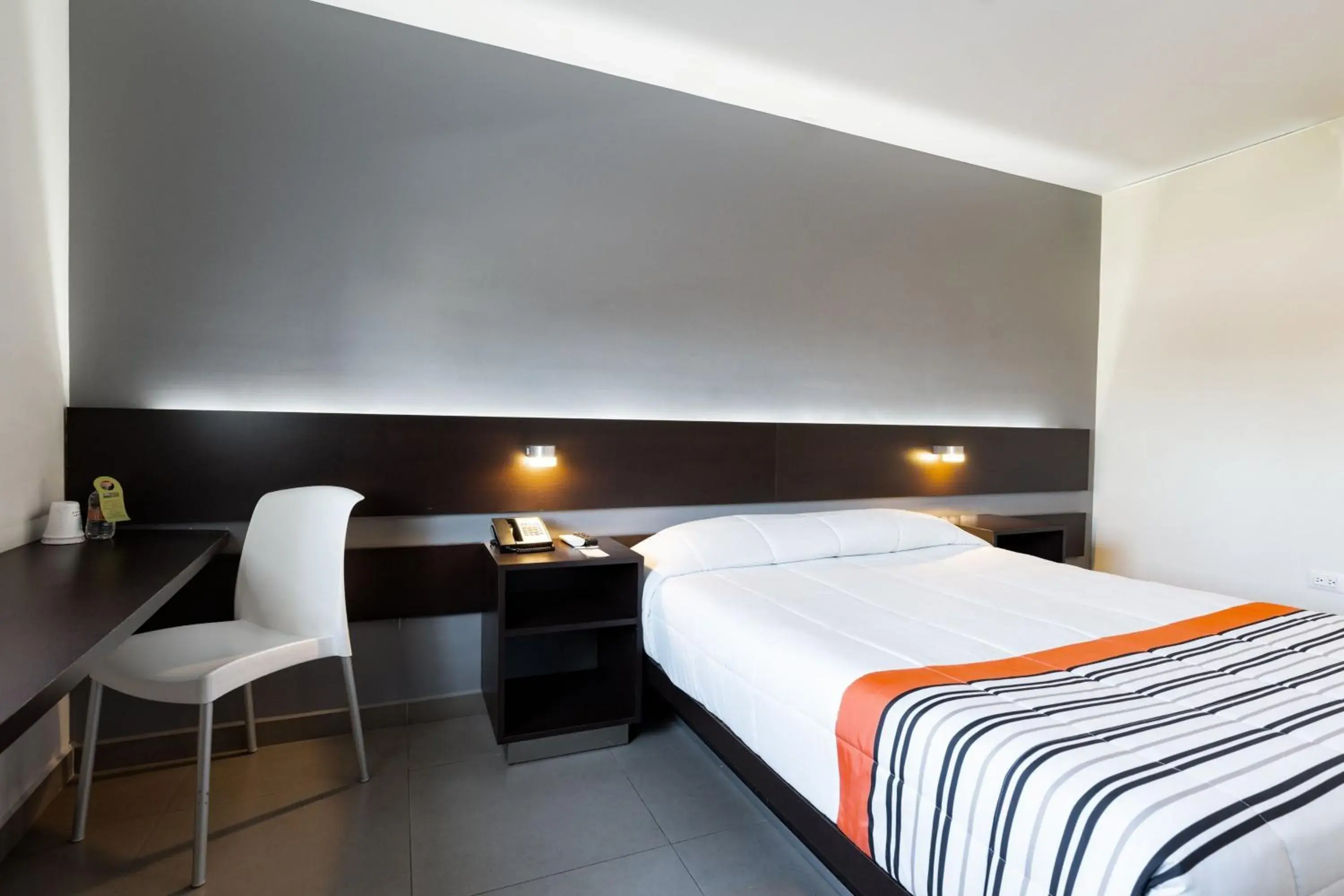 Photo of the whole room, Bed in City Express Junior by Marriott Aguascalientes Centro Photo of the whole room, Bed in City Express Junior by Marriott Aguascalientes Centro