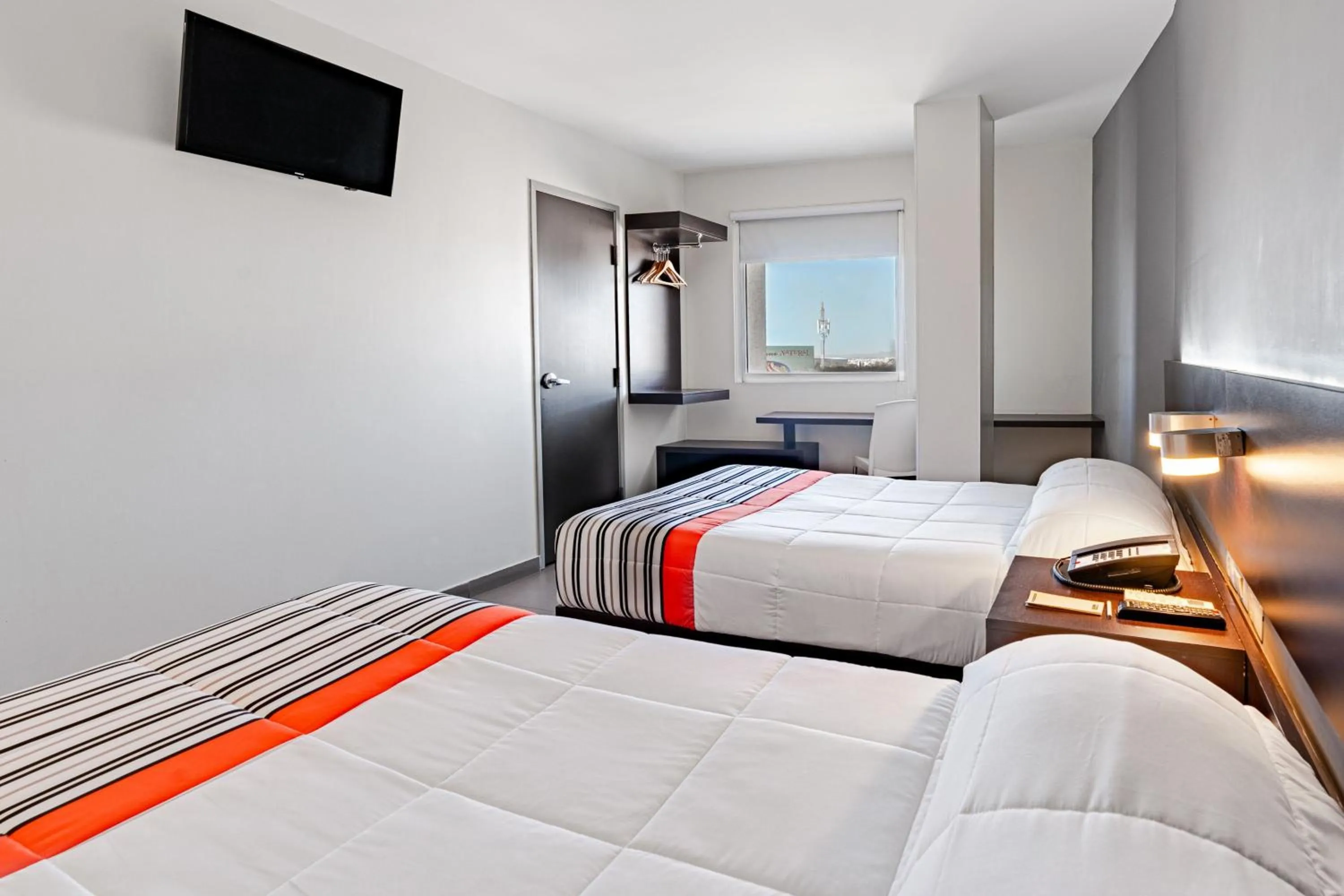 Photo of the whole room, Bed in City Express Junior by Marriott Aguascalientes Centro