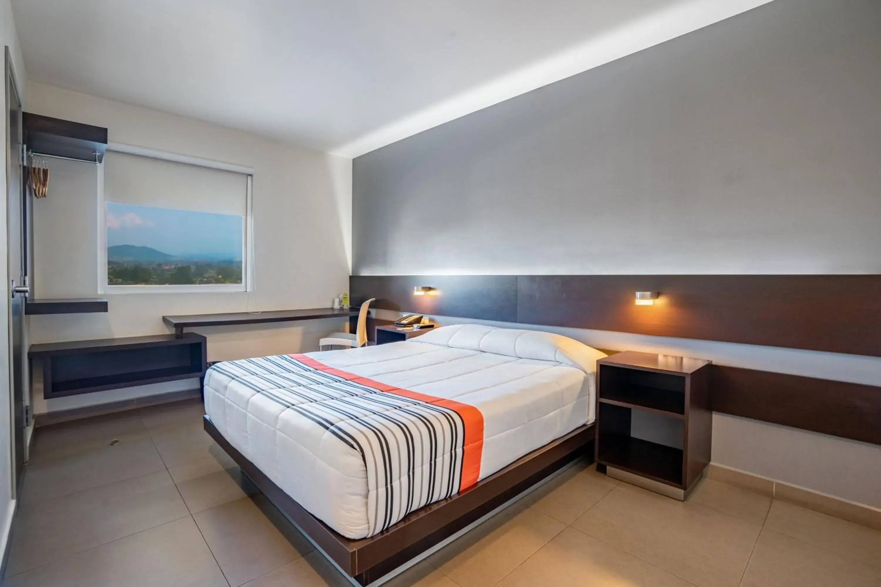 Photo of the whole room, Bed in City Express Junior by Marriott Aguascalientes Centro Photo of the whole room, Bed in City Express Junior by Marriott Aguascalientes Centro