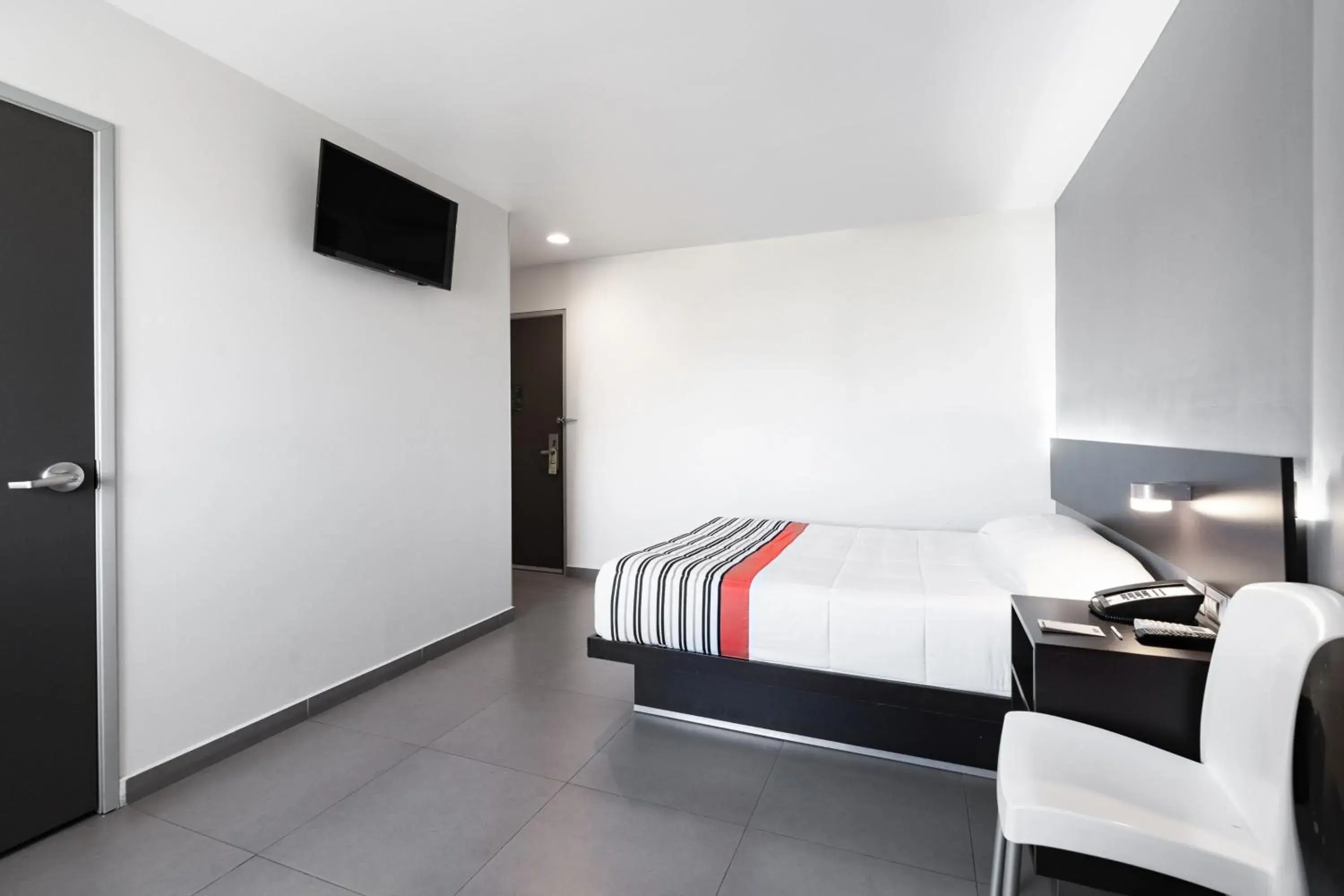 Photo of the whole room, Bed in City Express Junior by Marriott Aguascalientes Centro Photo of the whole room, Bed in City Express Junior by Marriott Aguascalientes Centro