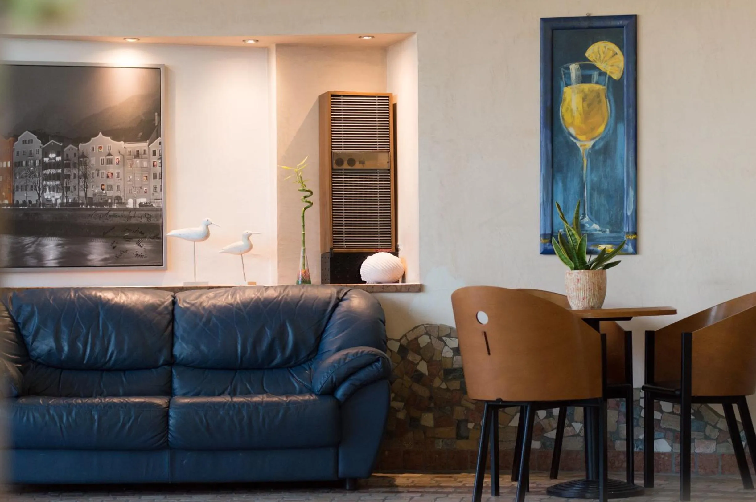 Communal lounge/ TV room in Amba Hotel