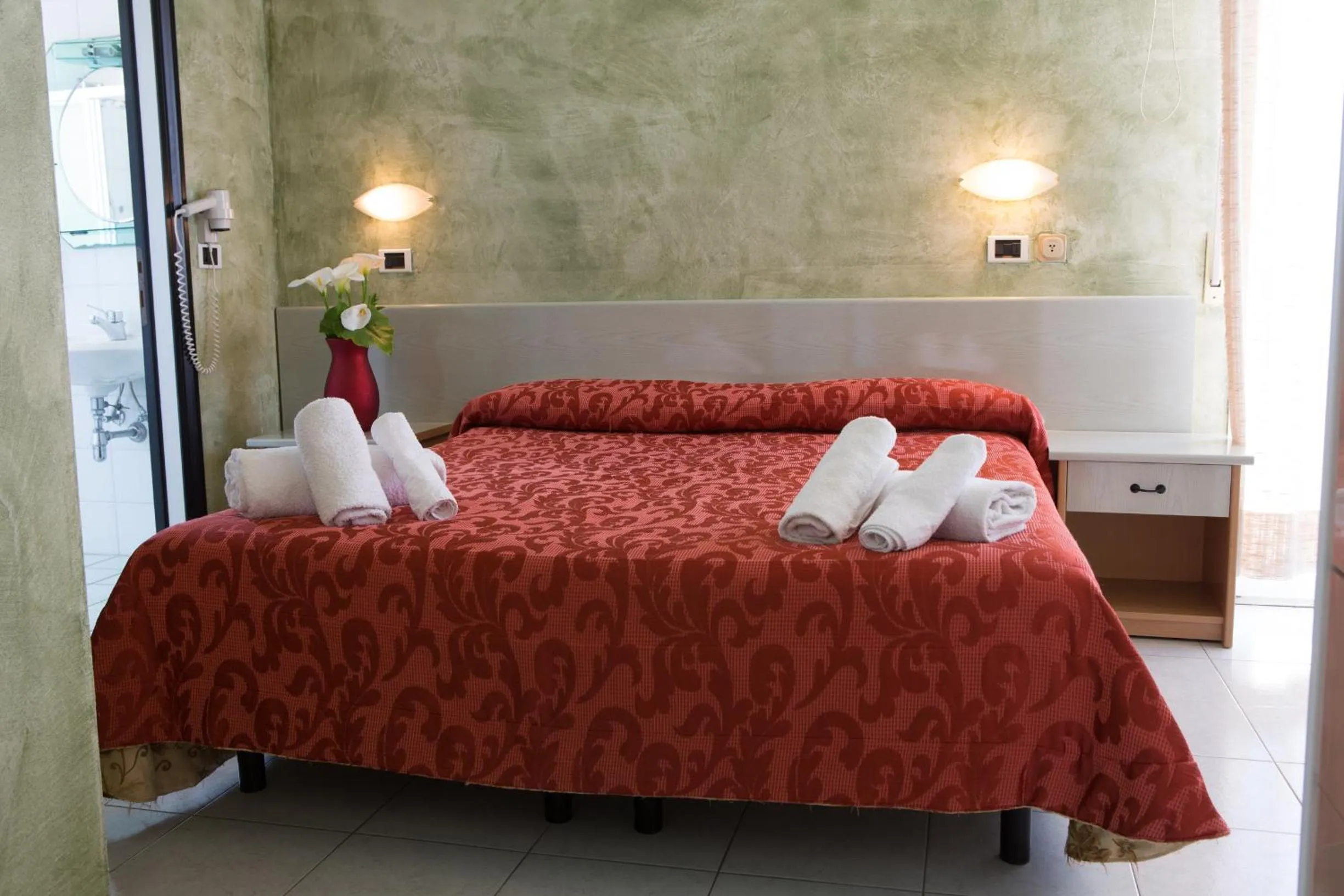 Bedroom in Amba Hotel