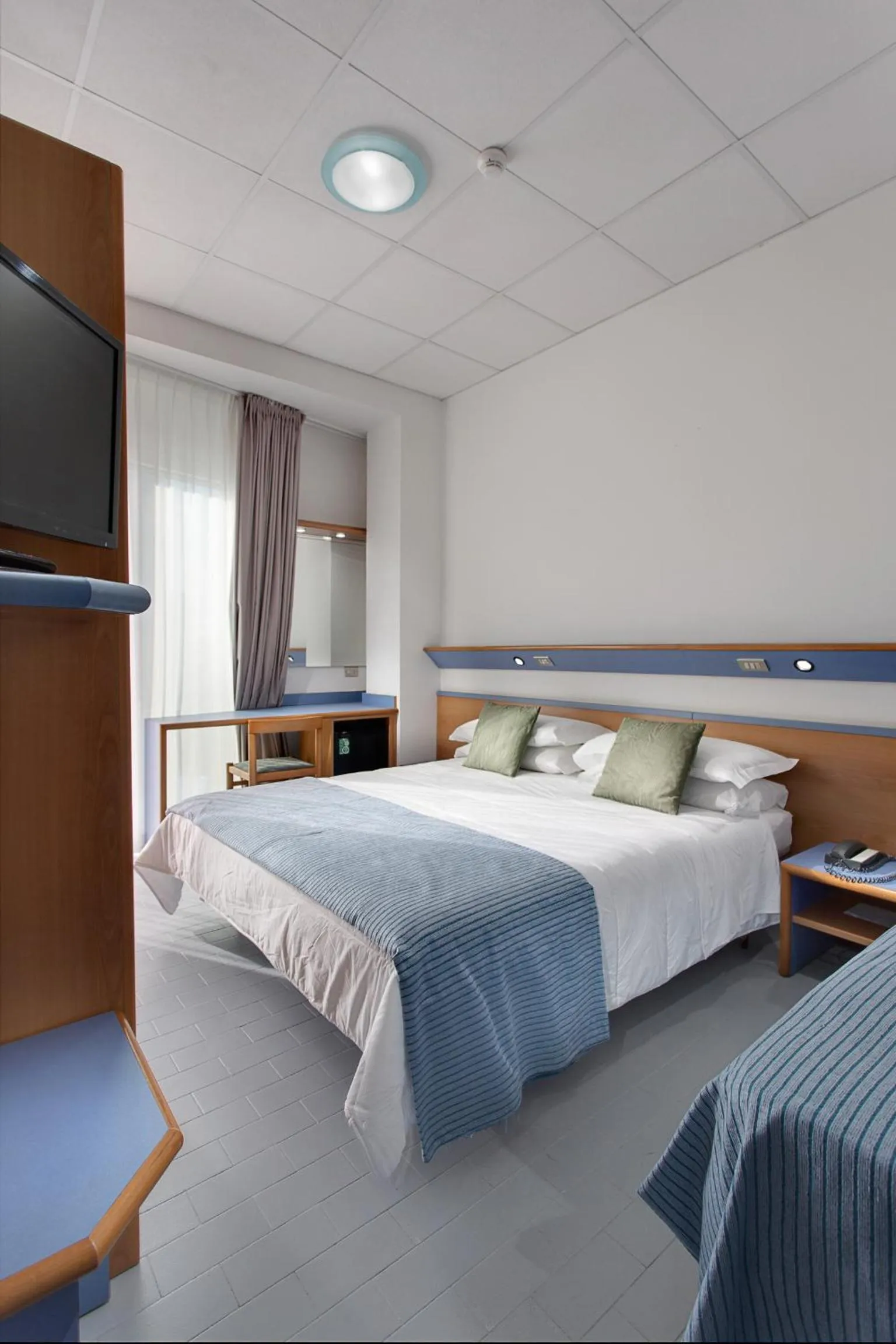 Bed in El Cid Campeador - Family Hotel