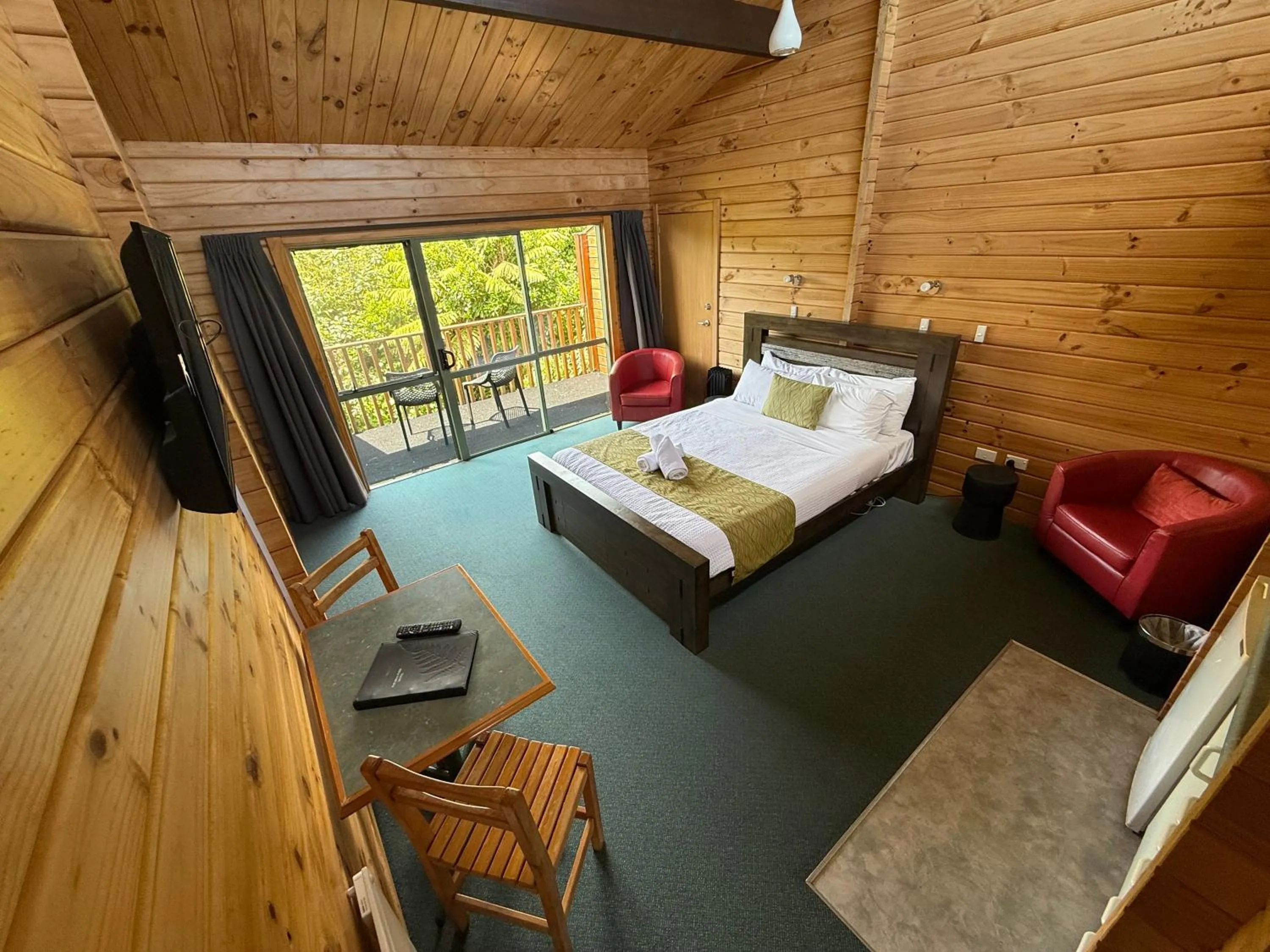 Bed in Paparoa Park Motel