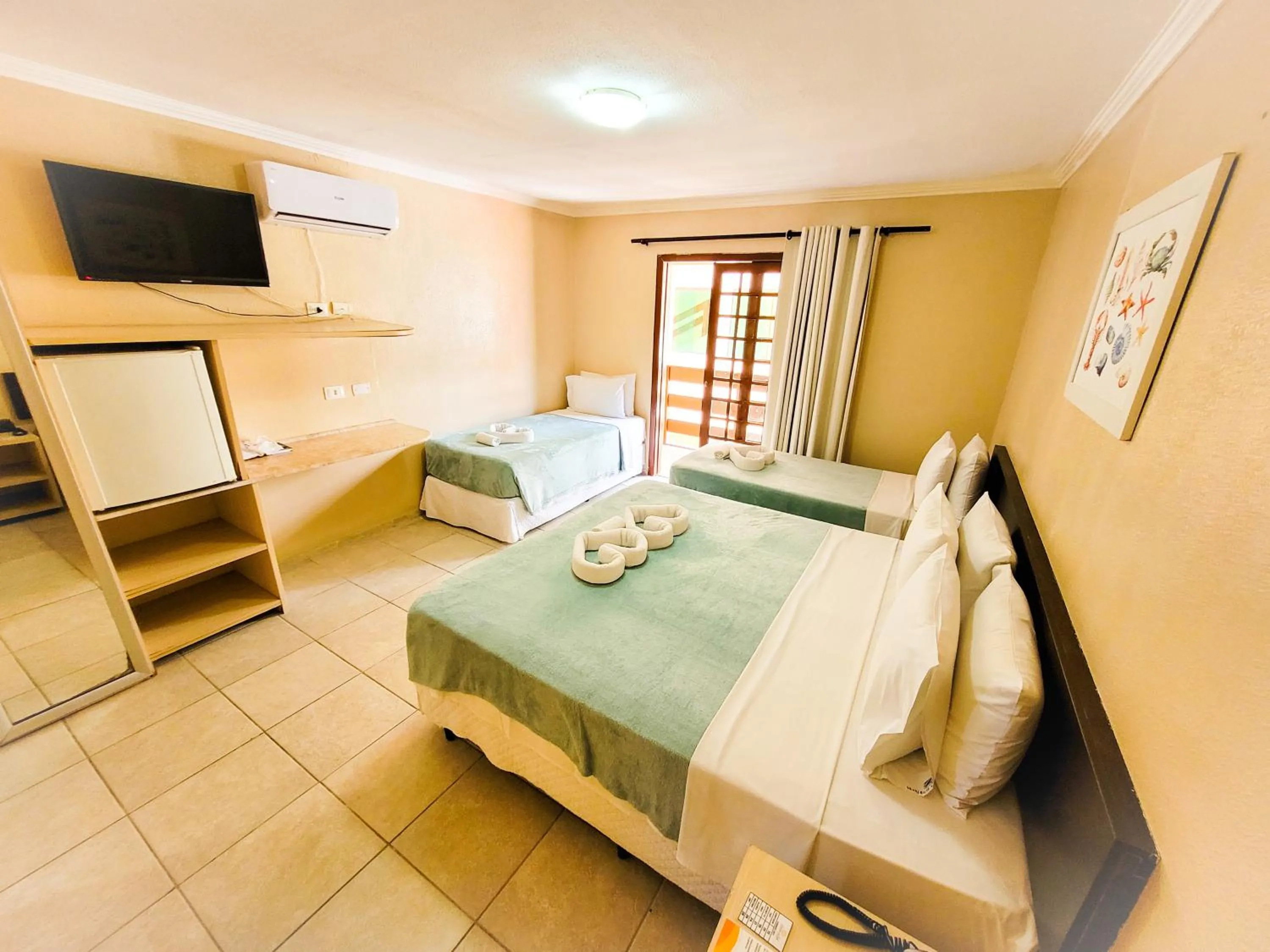 Photo of the whole room, Bed in Estação do Sol Praia Hotel