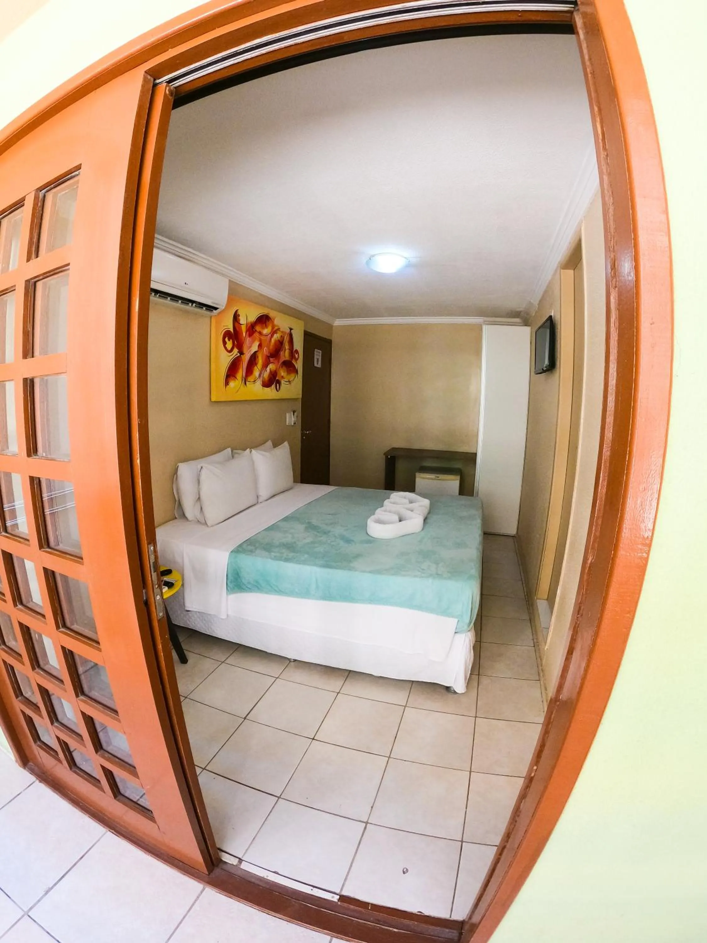 Photo of the whole room, Bed in Estação do Sol Praia Hotel