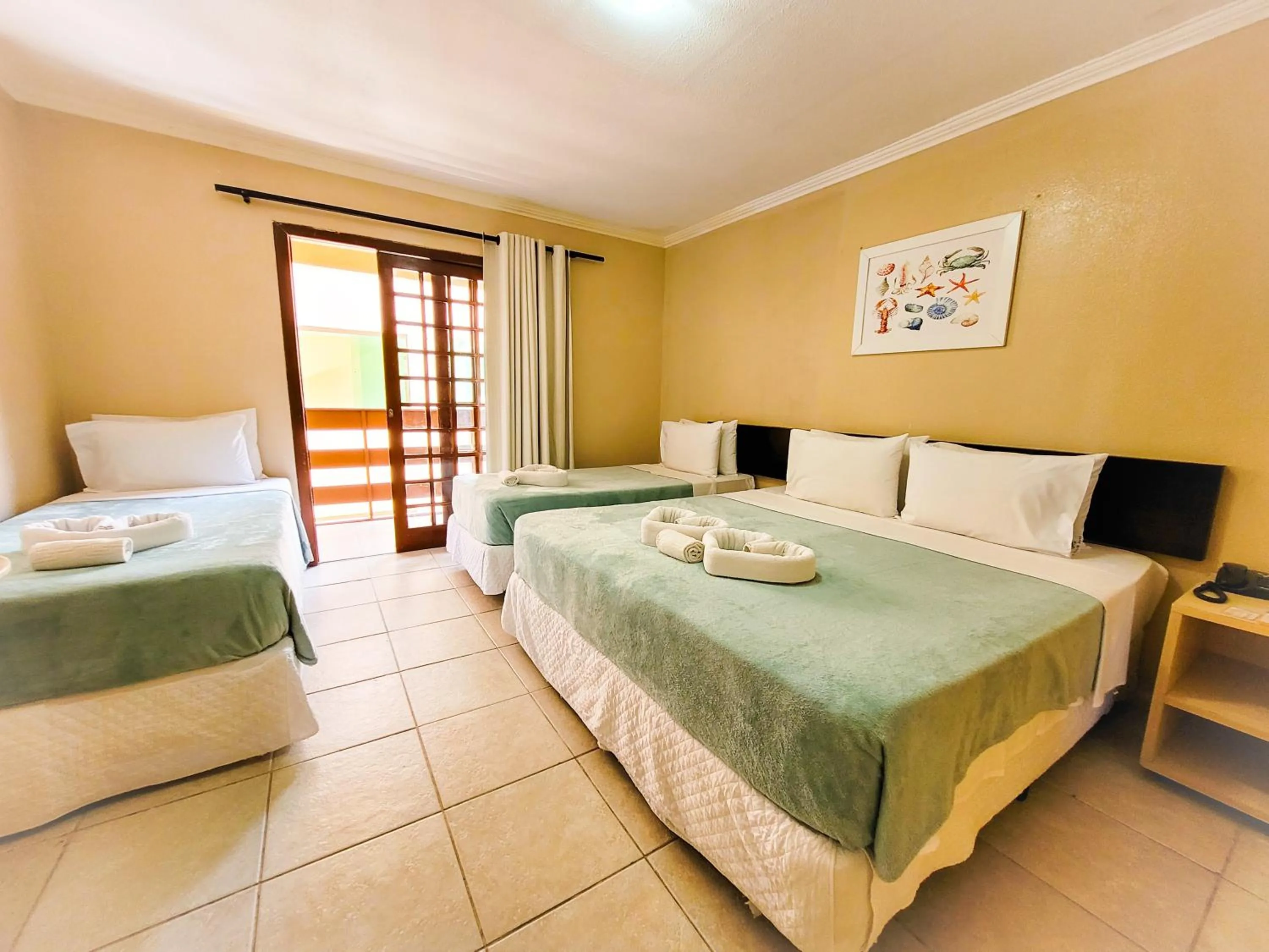Photo of the whole room, Bed in Estação do Sol Praia Hotel