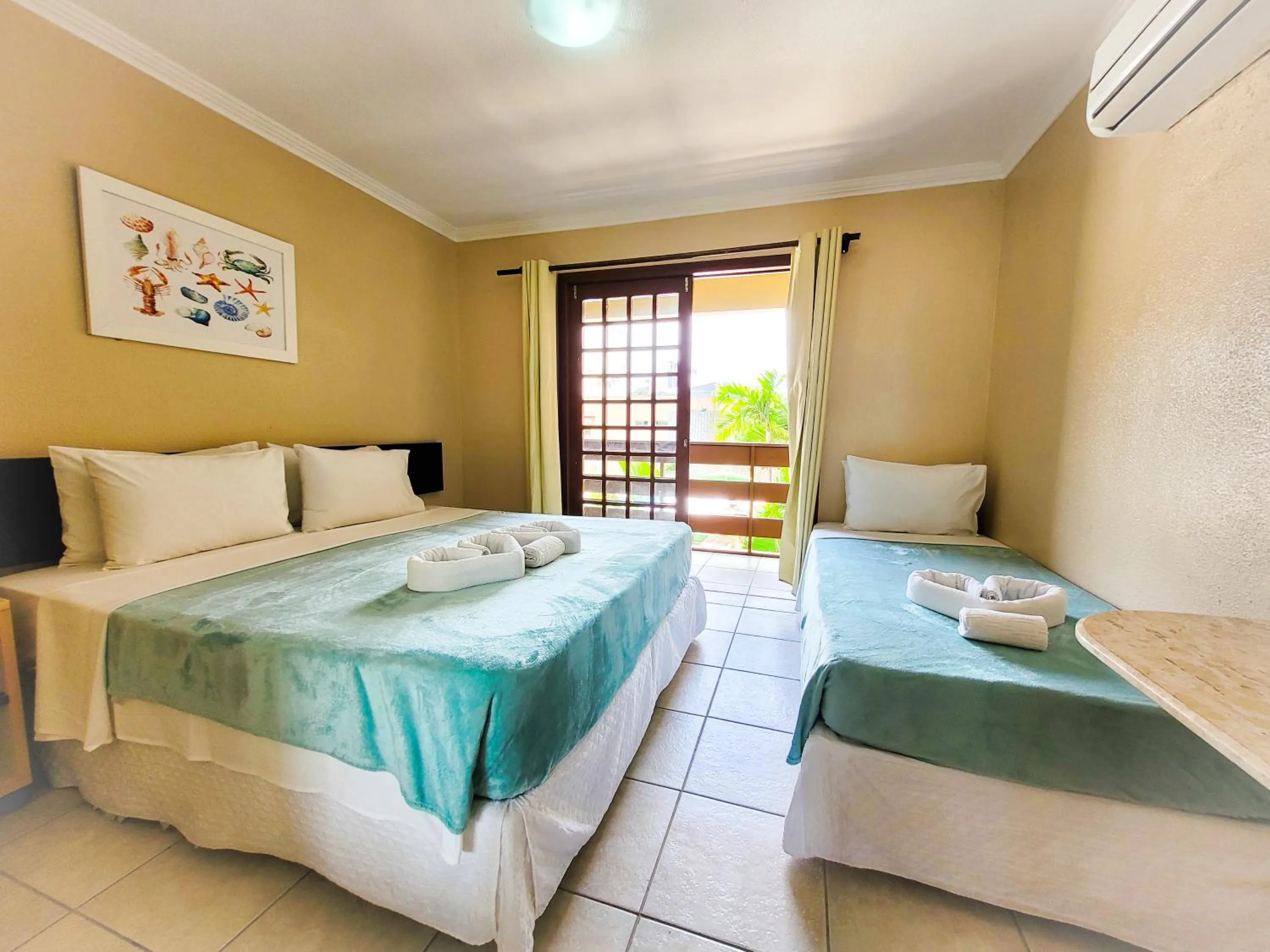 Photo of the whole room, Bed in Estação do Sol Praia Hotel