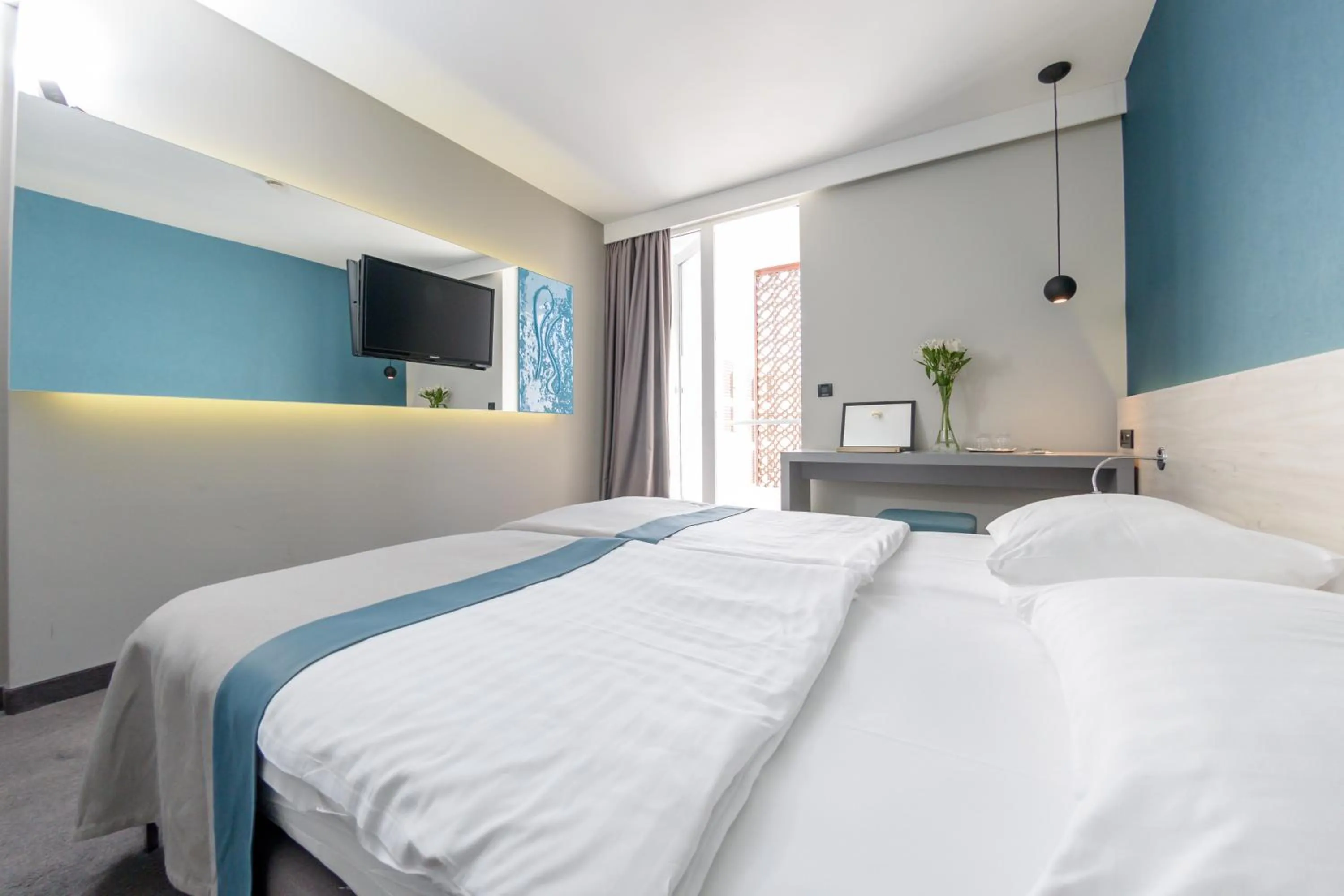 Bed in Hotel Kolovare