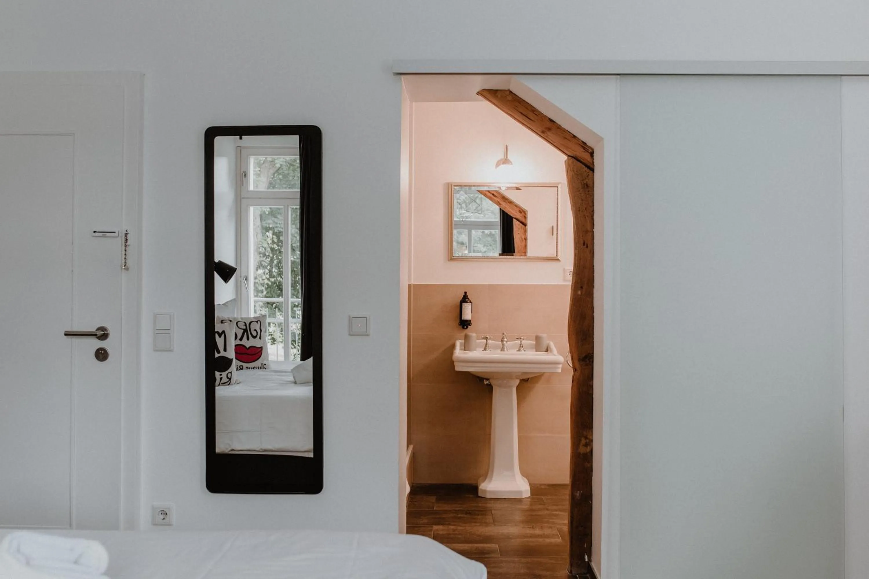 Bathroom, Bed in Hotel Palmenbad