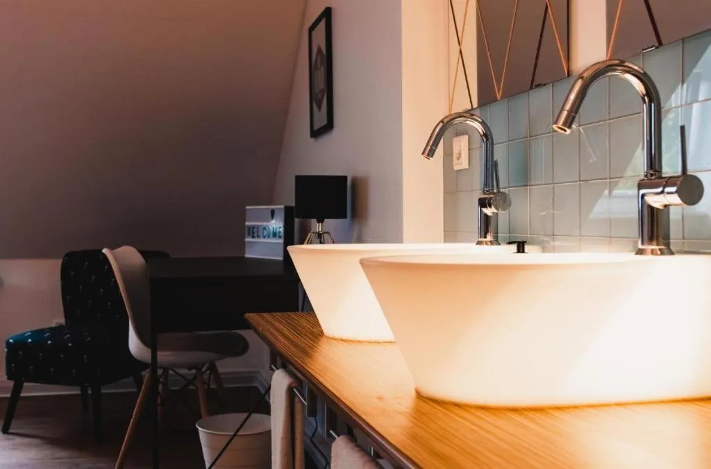 Bathroom in Hotel Palmenbad