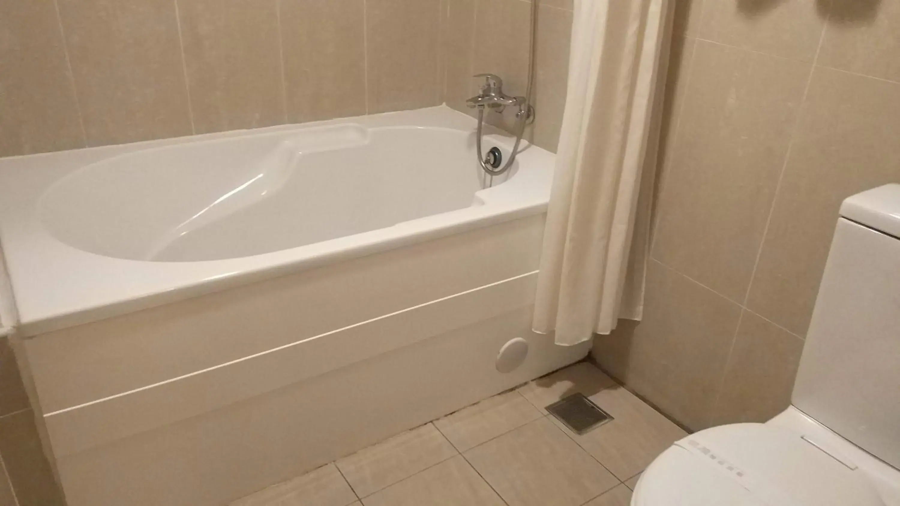 Bathroom in Elegance Hotel Bathroom in Elegance Hotel