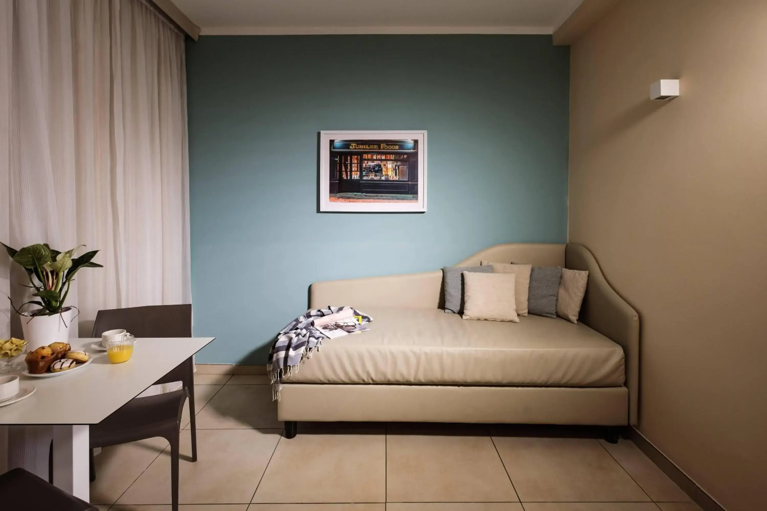 Photo of the whole room in 115 The Strand Hotel by NEU Collective Photo of the whole room in 115 The Strand Hotel by NEU Collective