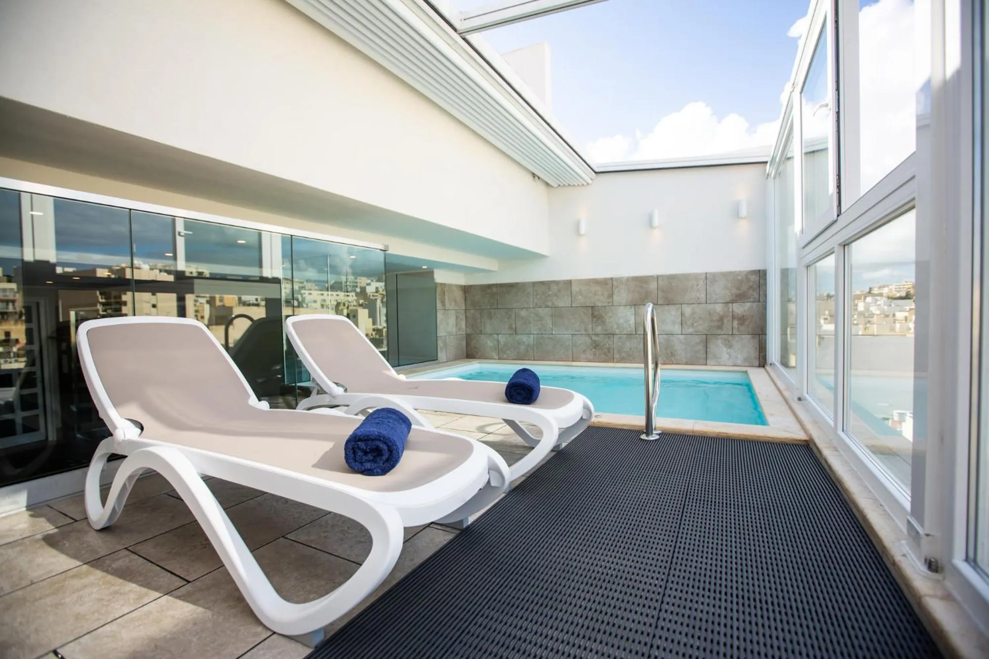 Swimming pool in 115 The Strand Hotel by NEU Collective