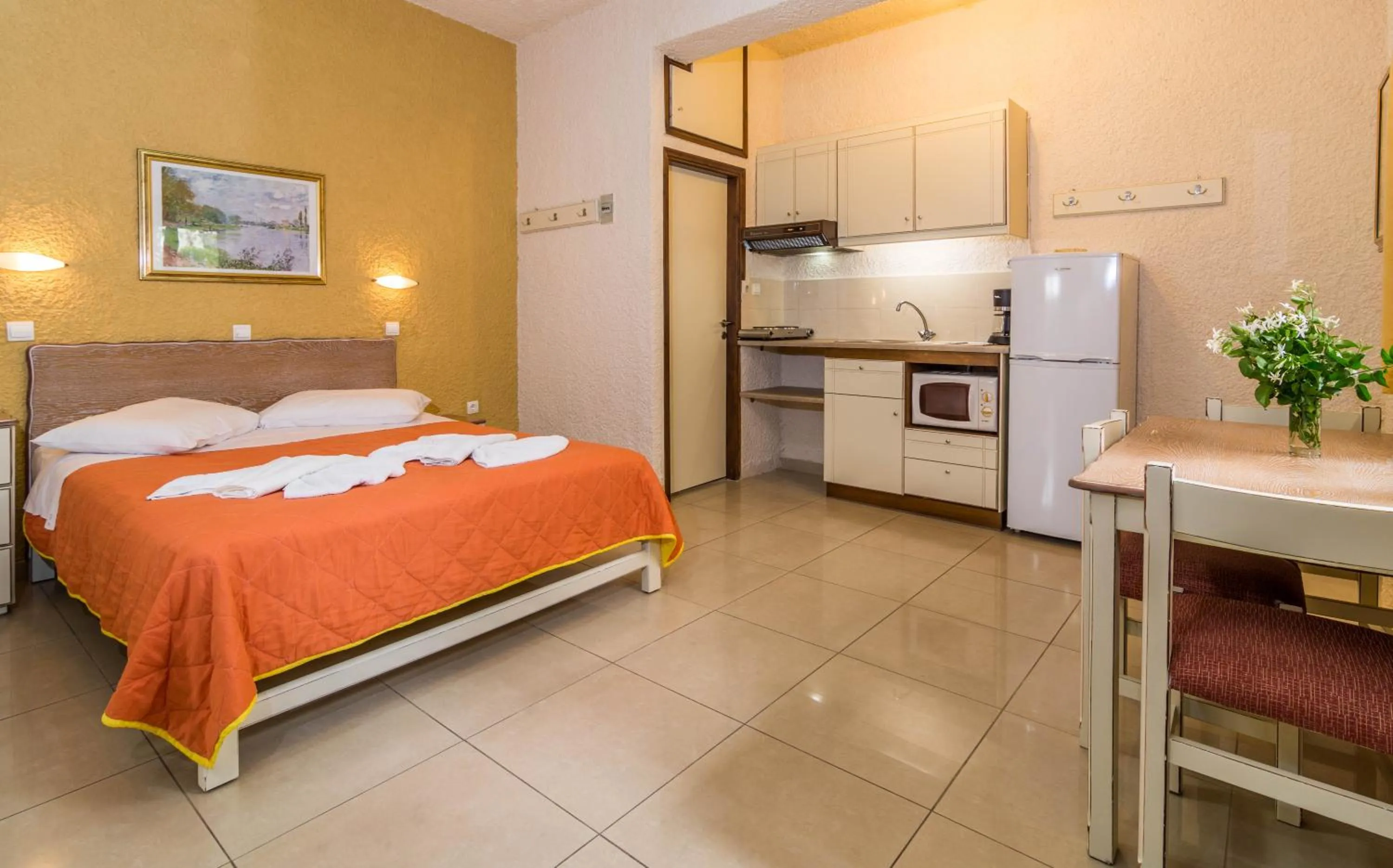 Kitchen or kitchenette, Bed in Lito Apartments Paleochora