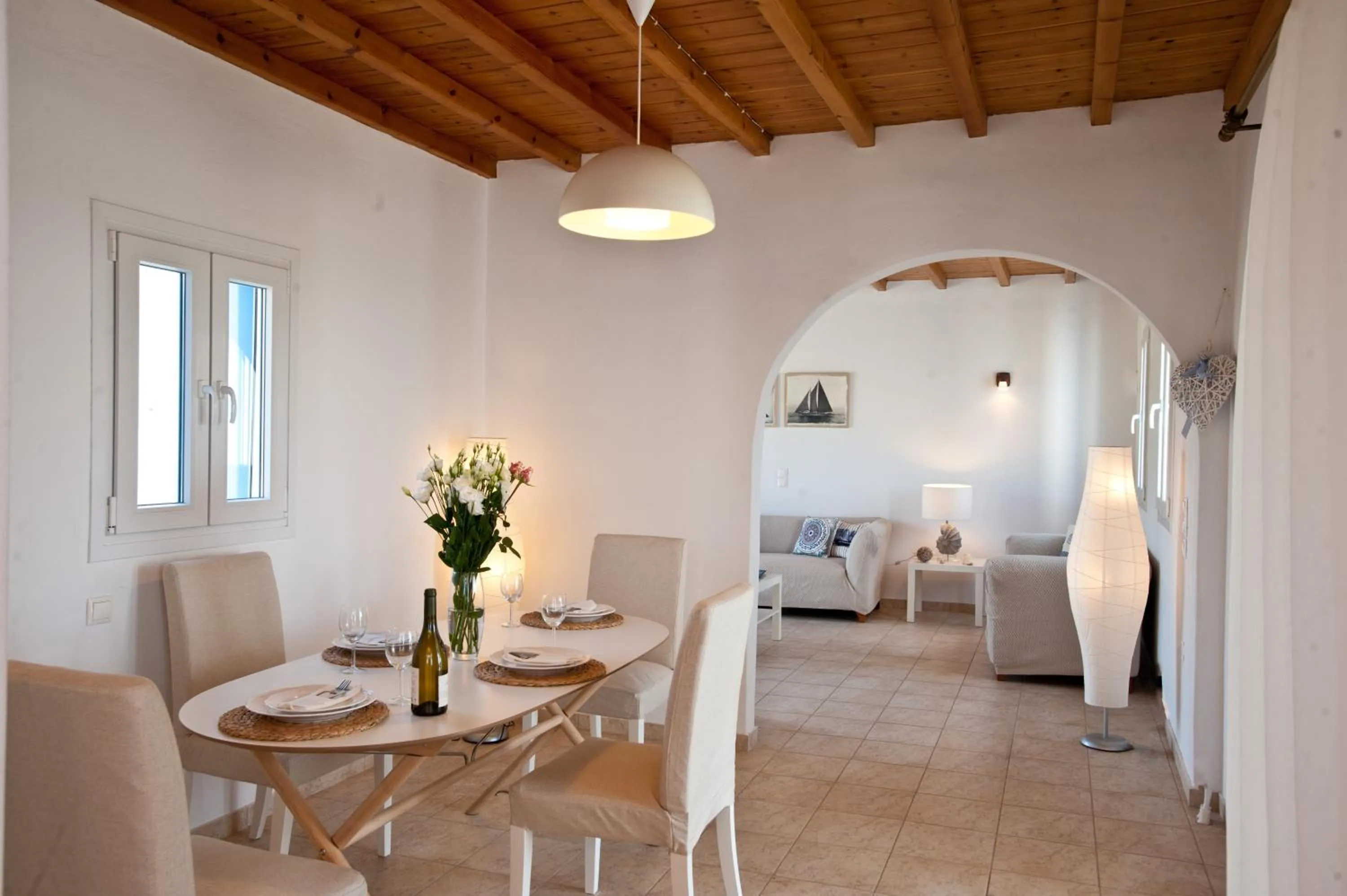 Dining area, Bed in Sea Wind Villas and Suites