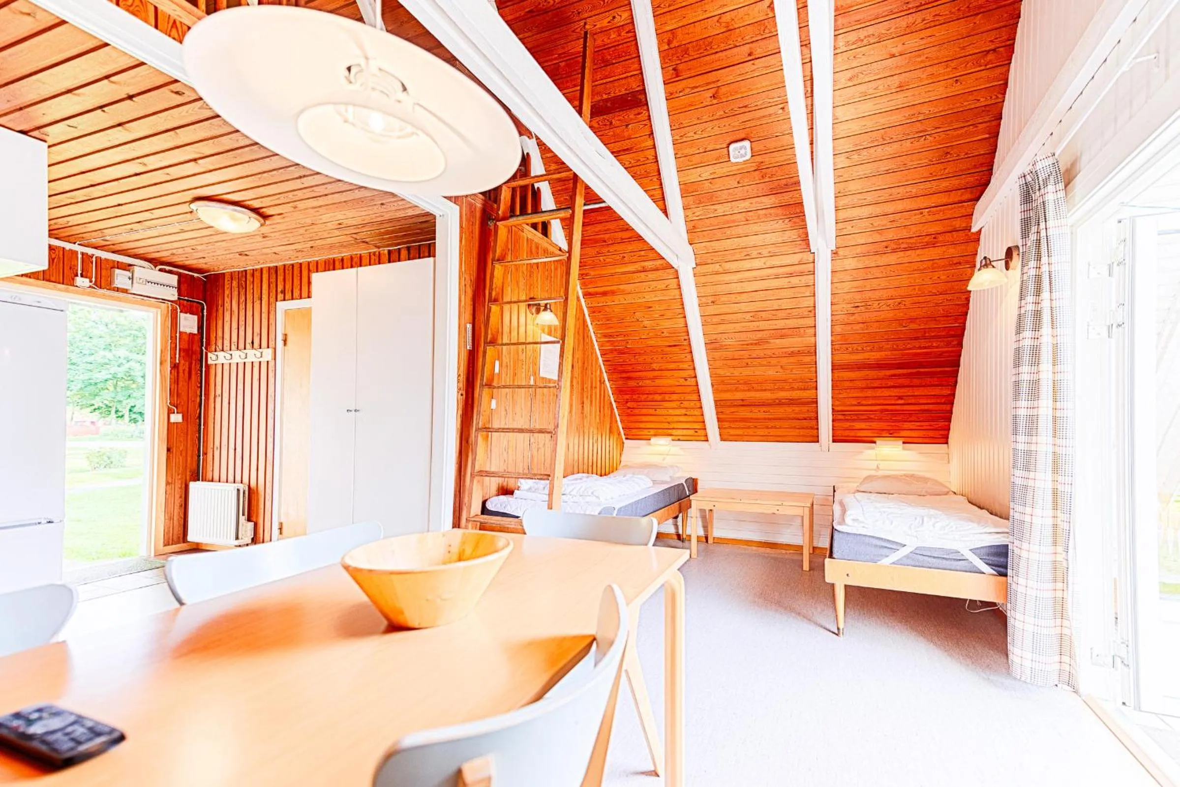 Living room, Bed in Borstahusen Campingresort
