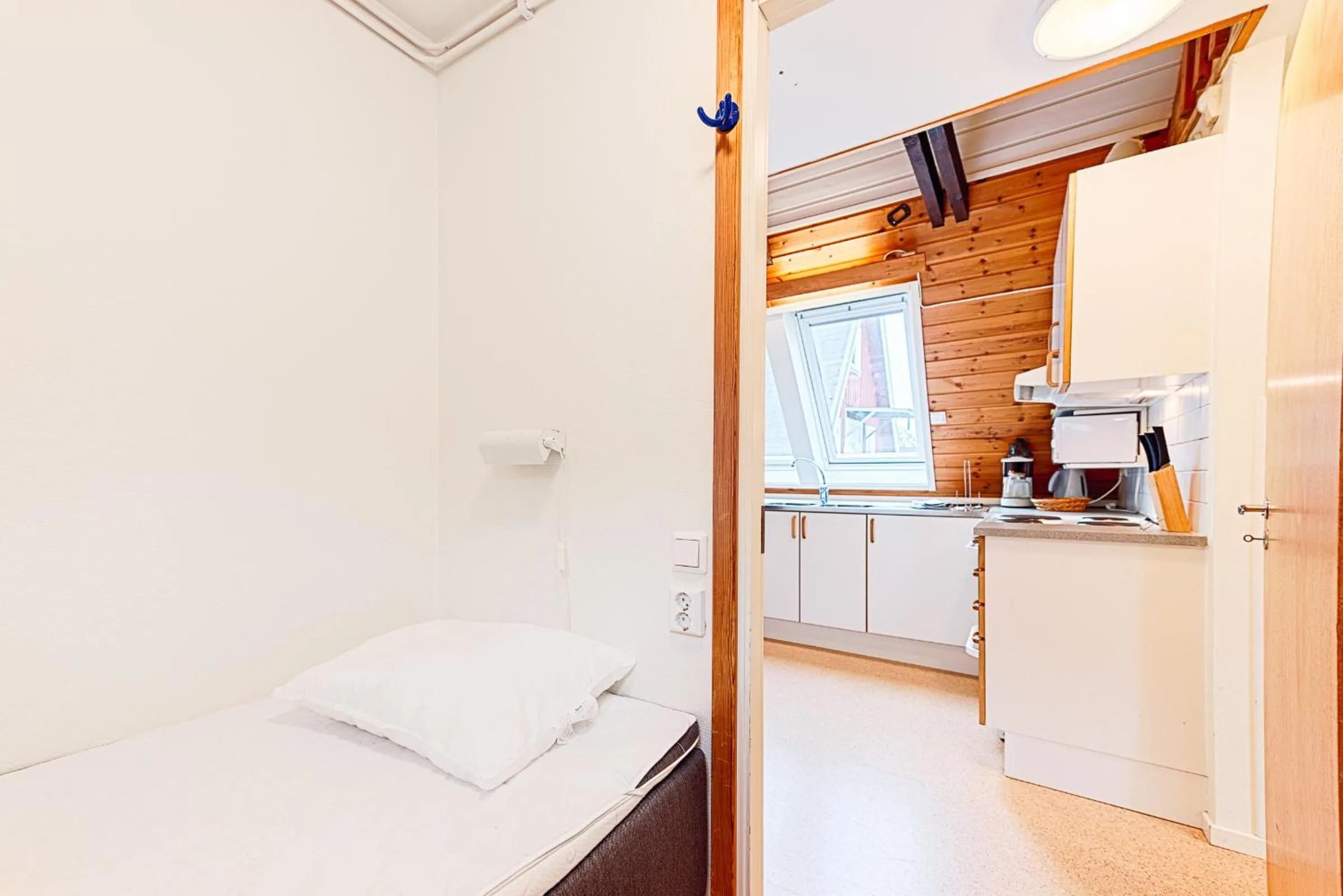 Kitchen or kitchenette, Bed in Borstahusen Campingresort