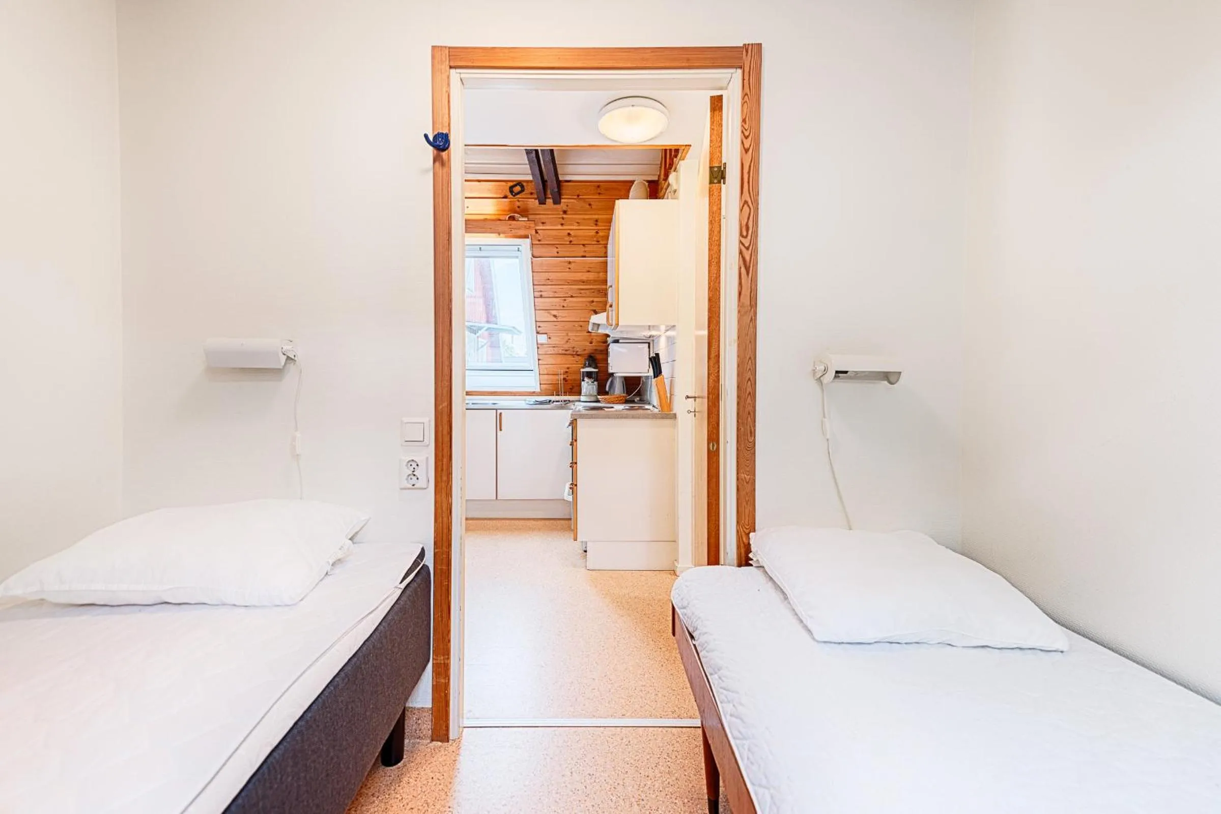 Kitchen or kitchenette, Bed in Borstahusen Campingresort