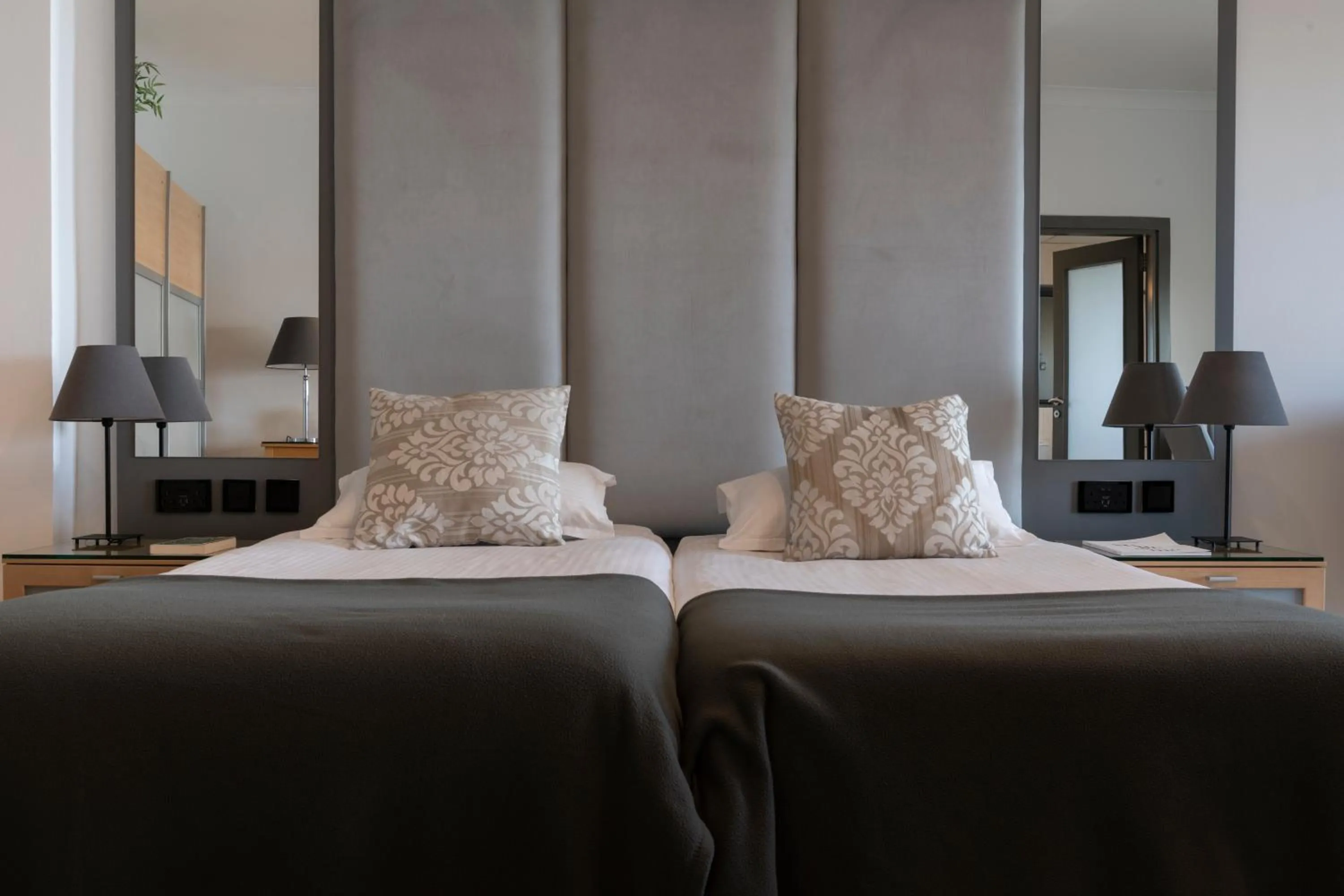 Bed in Plaza Regency Hotels