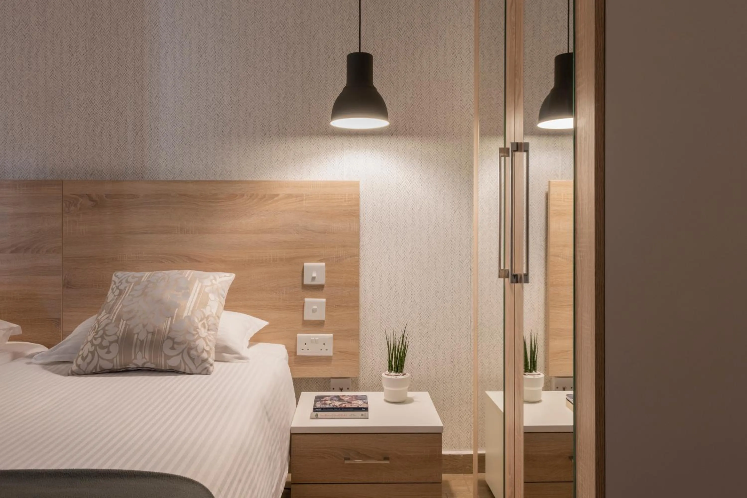 Bed in Plaza Regency Hotels