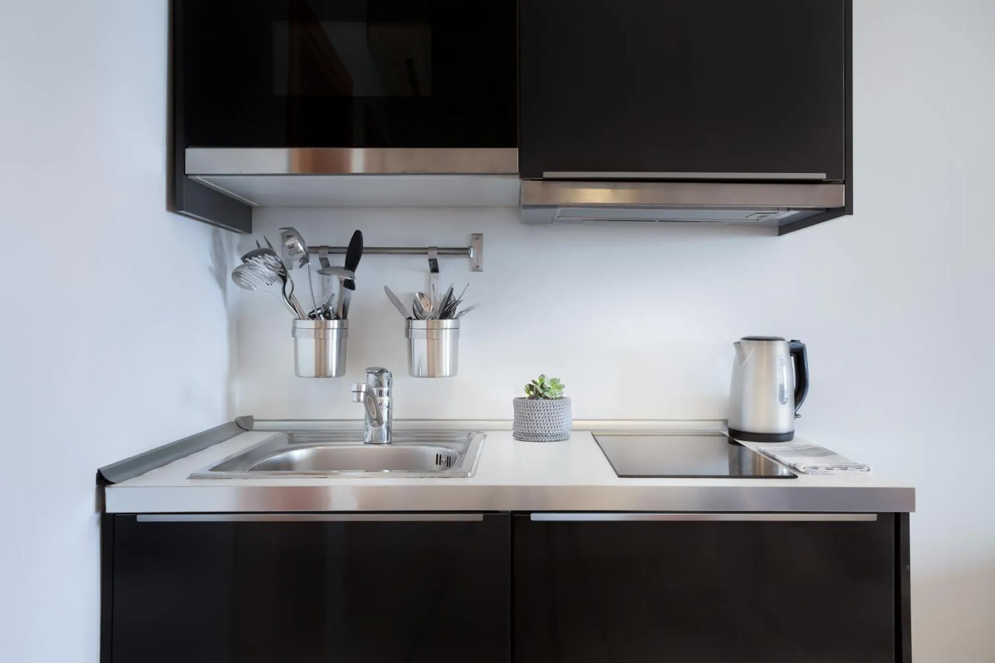 Kitchen or kitchenette in Plaza Regency Hotels